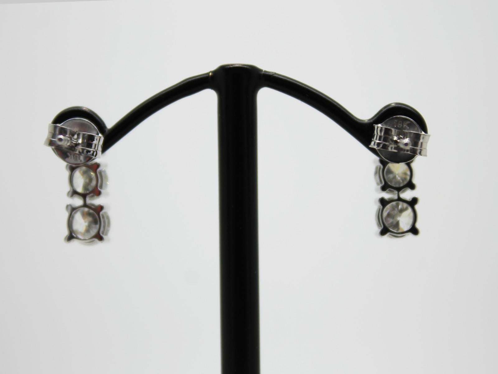 Modern 1.89 Carat Round Diamond Three-Stone Classic Drop 18 Karat White Gold Earrings For Sale