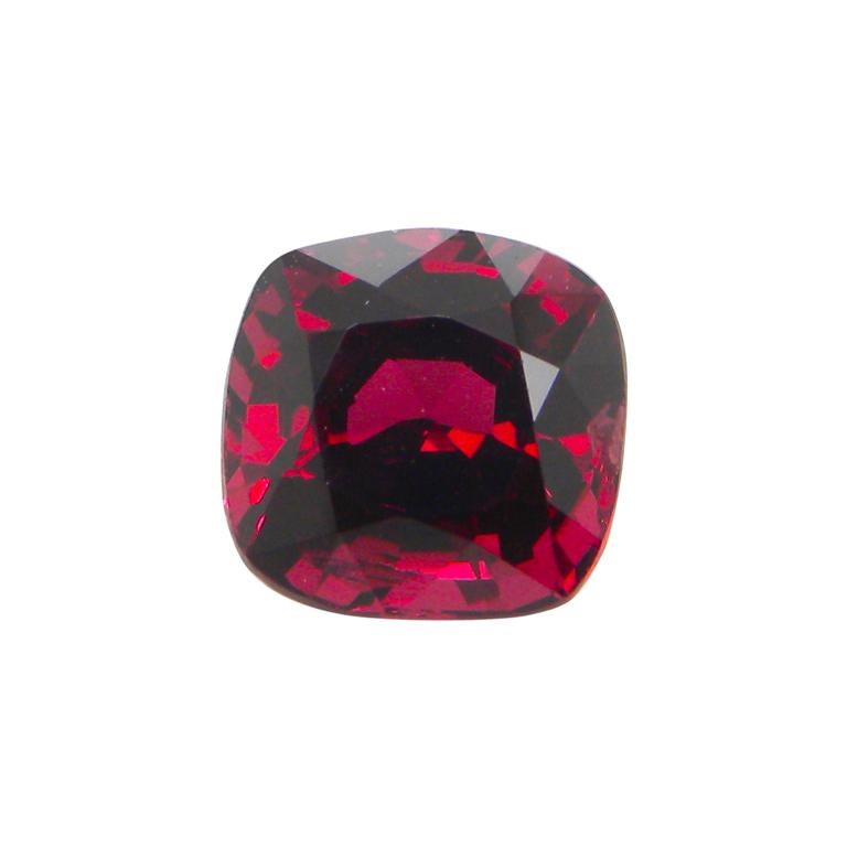 1.89 Carat Unheated Cushion-Cut Burmese Red Spinel:

A gorgeous gem, it is a 1.89 carat unheated cushion-cut Burmese red spinel. Hailing from the important Bawmar mine in Burma, the spinel possesses an intense red colour saturation, with great