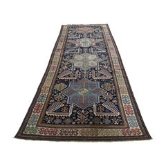 Tapis caucasien ancien Akstafa bleu nuit, paons, 1890