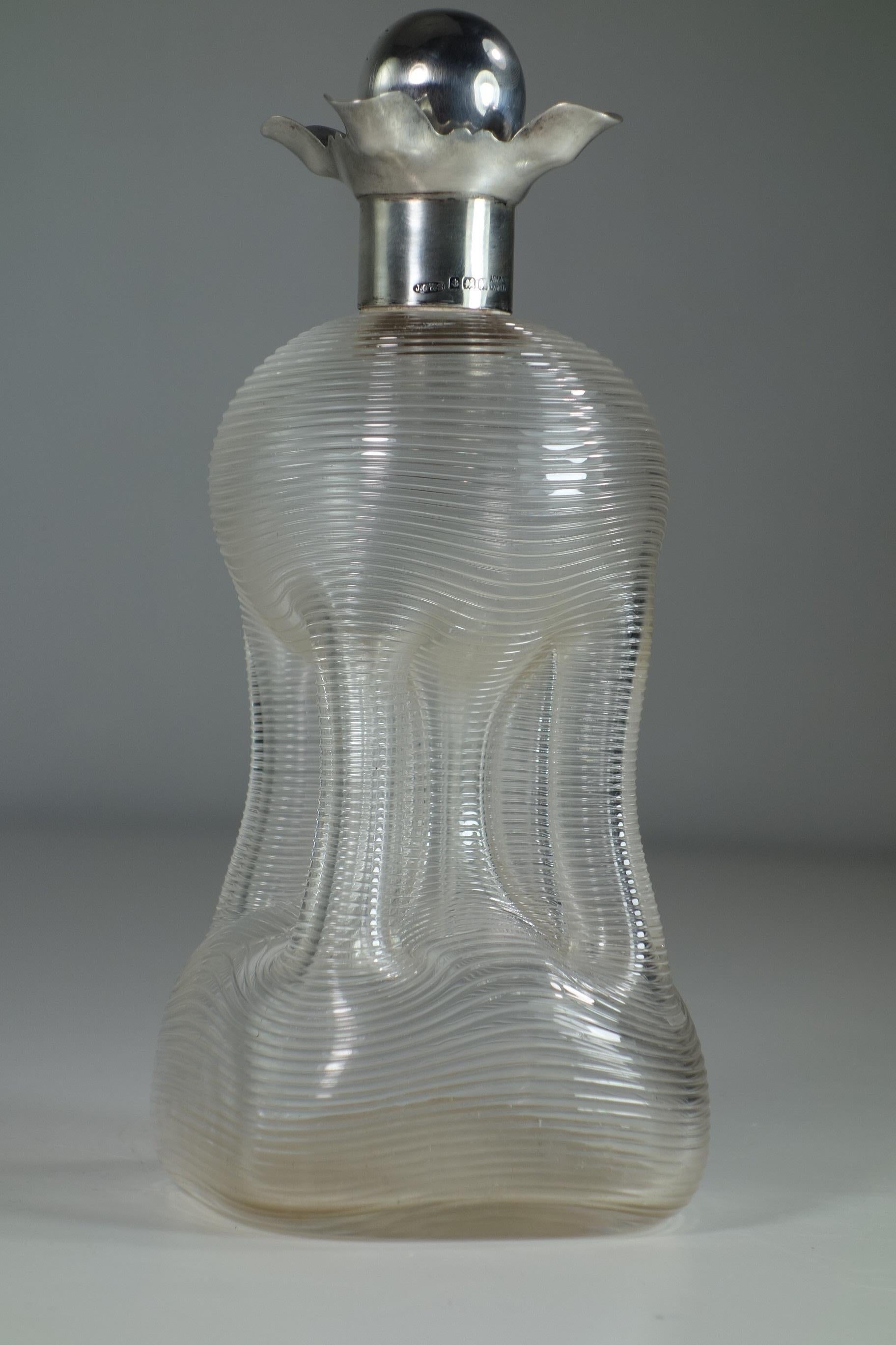 Victorian Decanter
Asprey, London
1890-1900

Sterling Silver and Blown Glass
Excellent condiction

Silver Marks and 