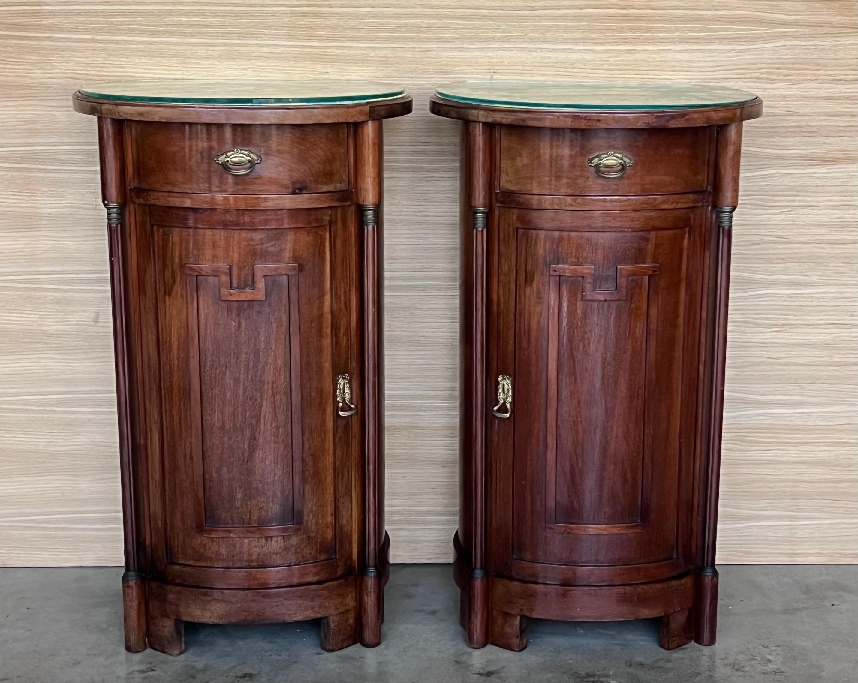 
Biedermeier drum form nightstands/bedside tables that could also serve as dry bar cabinets, side tables, or lamp tables. Heirloom-quality furniture that will last a lifetime. Each piece expertly crafted supported by a cylinder form base. A single