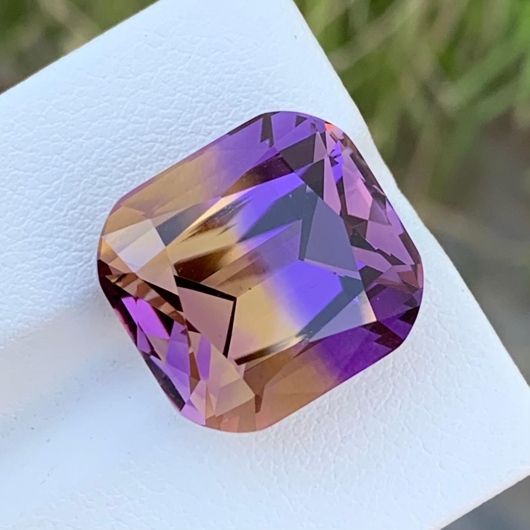 Loose Ametrine 
Weight: 18.90 Carats 
Dimension: 15.8 x 14.8 x 11.8 Mm 
Colour: Purple and Yellow 
Shape: Cushion 
Origin: Bolivia 
Treatment: Non 
Certificate: On Demand 

Ametrine is a captivating gemstone that seamlessly blends the striking hues