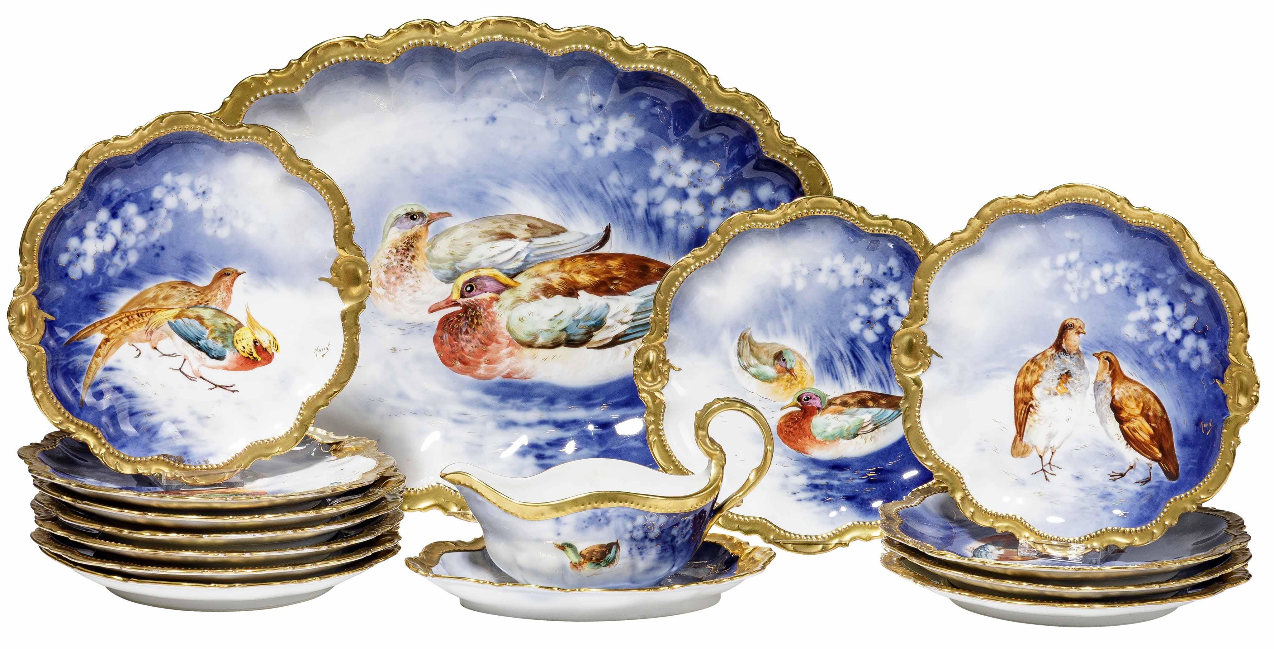 Very unusual with a deep blue sky in the background and wonderful colors, this antique Limoges set for 12 people is made with the finest quality Limoges porcelain by the Coronet Company, active under this name between 1881-1976. Paintings of the set