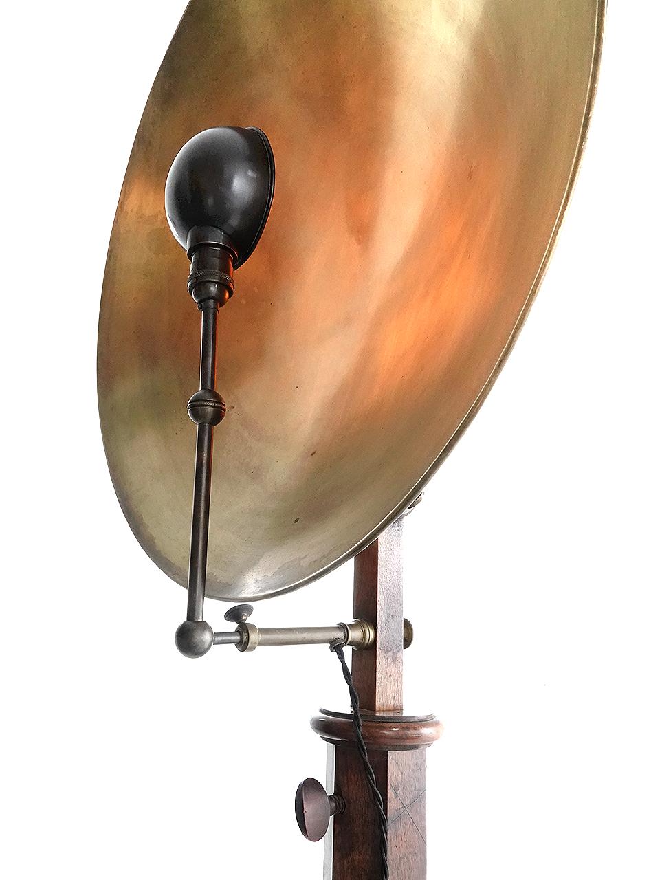 This is a extremely rare and early 19th century experimental device. This example is set up as a simple large reflective and dramatic floor lamp. Originally it was used for research of physical experiences that would focus light, heat and sound. The