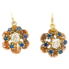 1890 Boucles d'oreilles victoriennes en or rose 14k avec fleurs en diamant et saphir