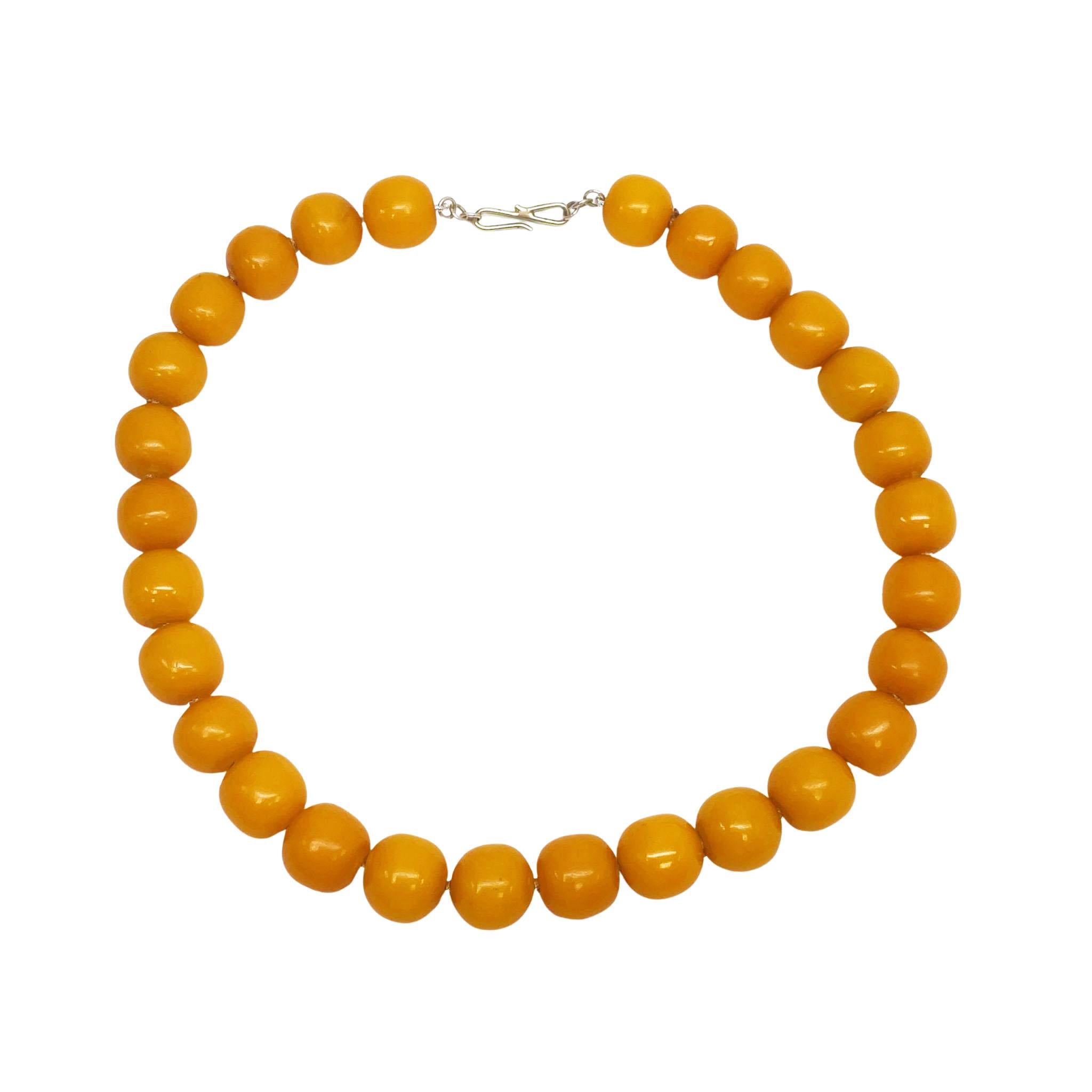 This is an absolutely delicious Butterscotch Amber beaded necklace dating back to the Victorian era! This necklace is 17