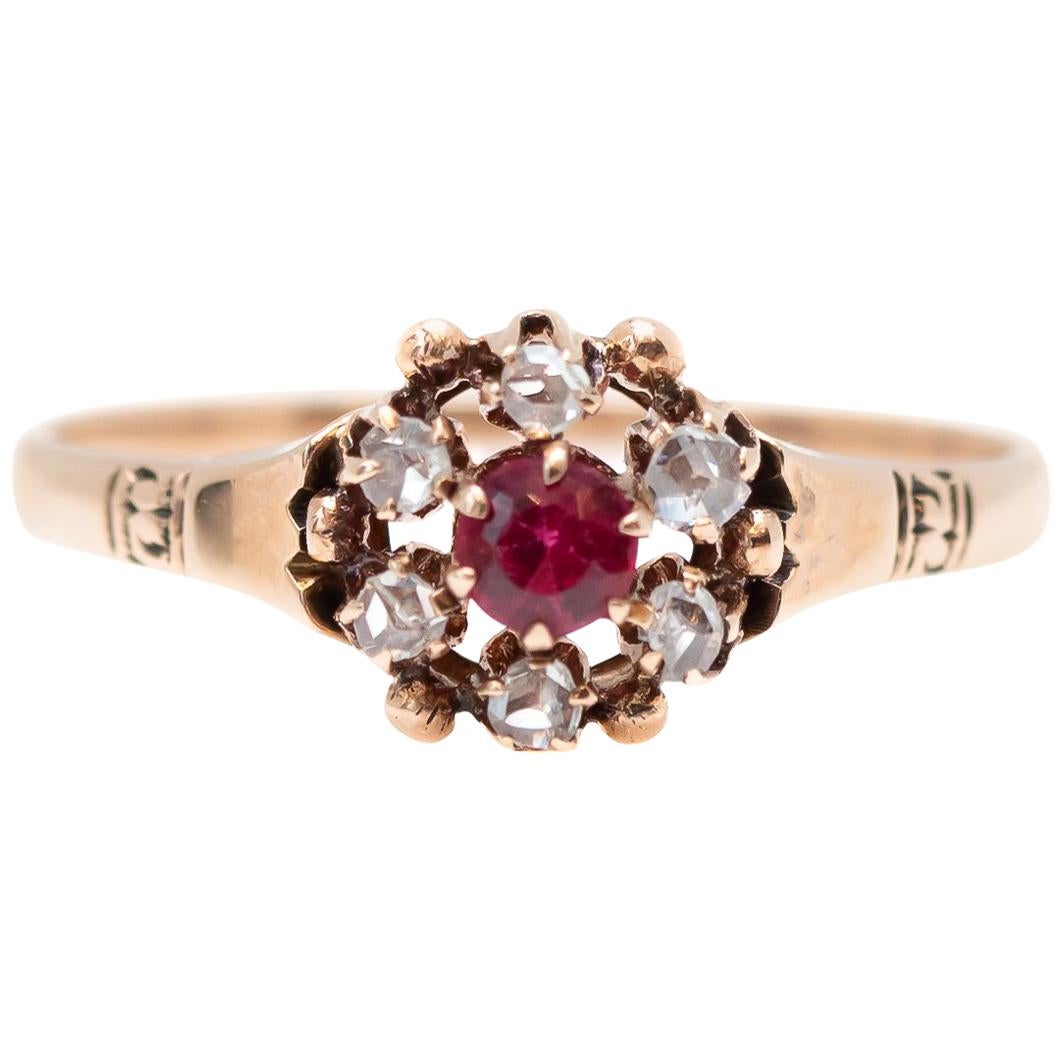 1890s 0.33 Carat Diamond Halo and Ruby Floral 9 Karat Gold Ring