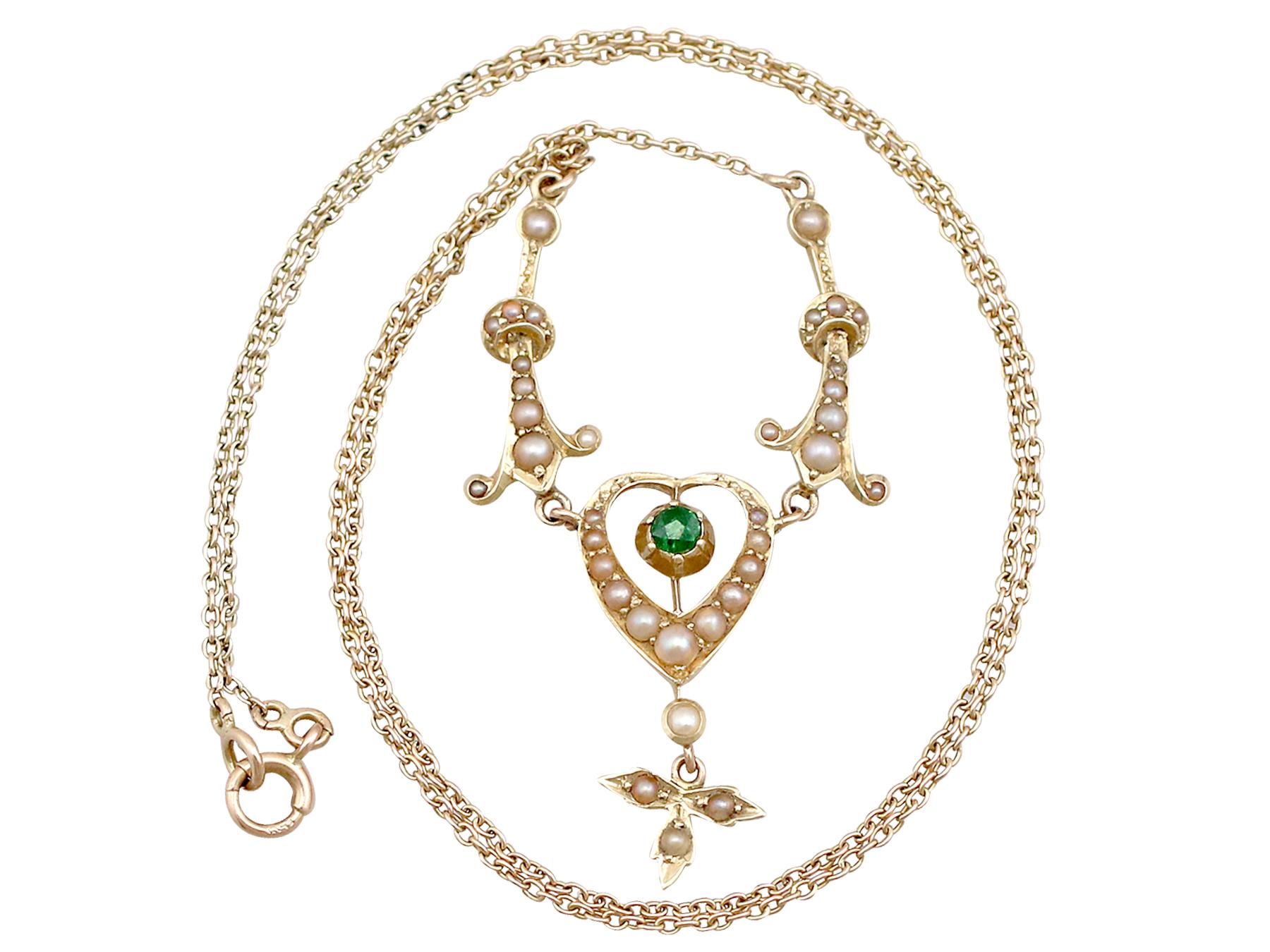 This fine and impressive peridot necklace has been crafted in 15k yellow gold.

The necklace displays a feature 0.12Ct round cut peridot bezel set to the center of a pierced decorated, pearl set, heart shaped setting.

A leaf design trefoil shaped