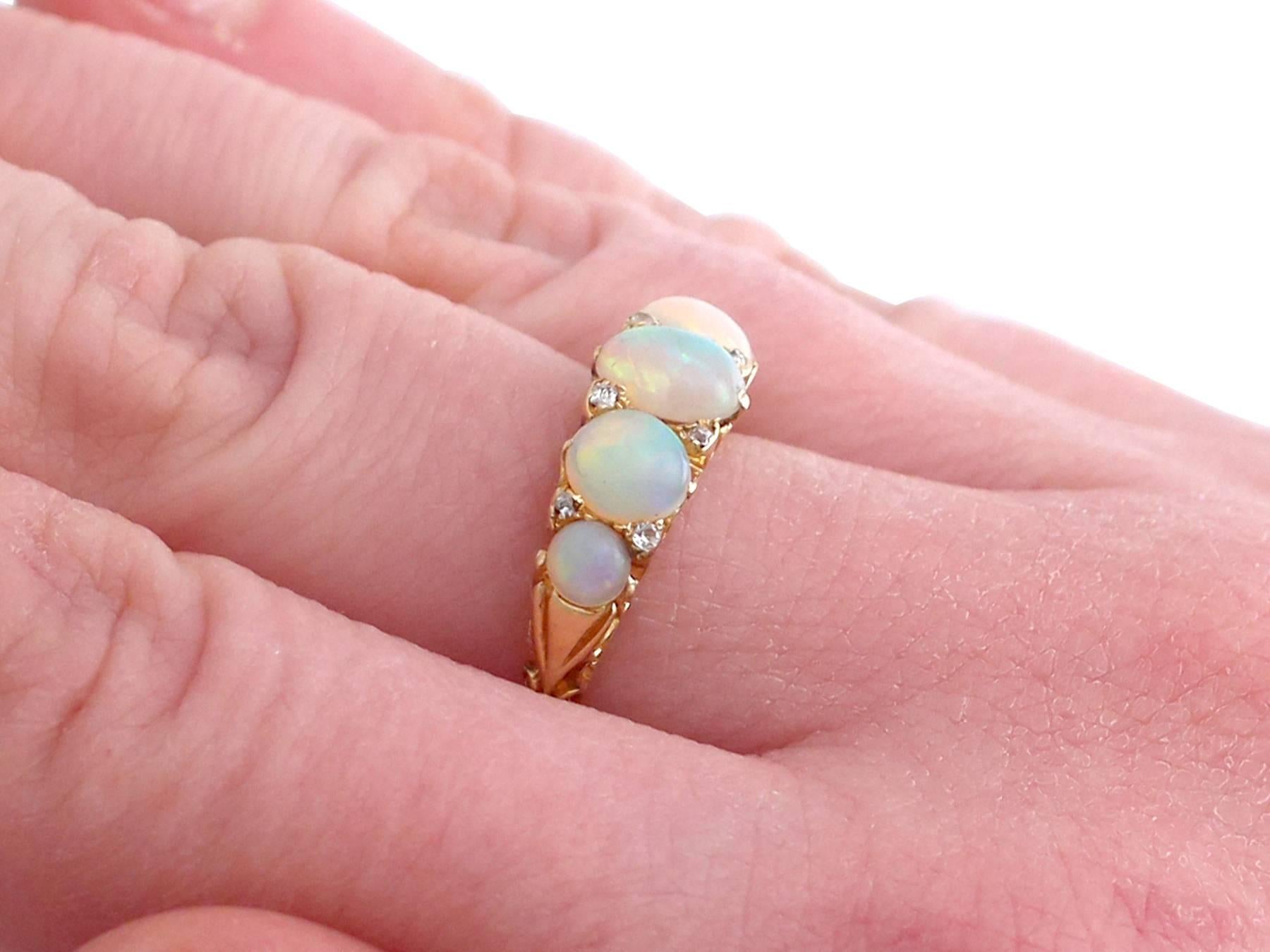 1890s Antique 1.72 Carat Opal and Diamond Yellow Gold Five-Stone Ring 3