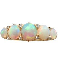 1890s Antique 1.72 Carat Opal and Diamond Yellow Gold Five-Stone Ring