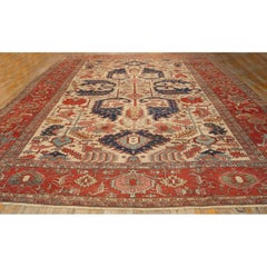 1890s Antique Beige & Red Border Geometric Serapi Knotted Room Size Wool Rug