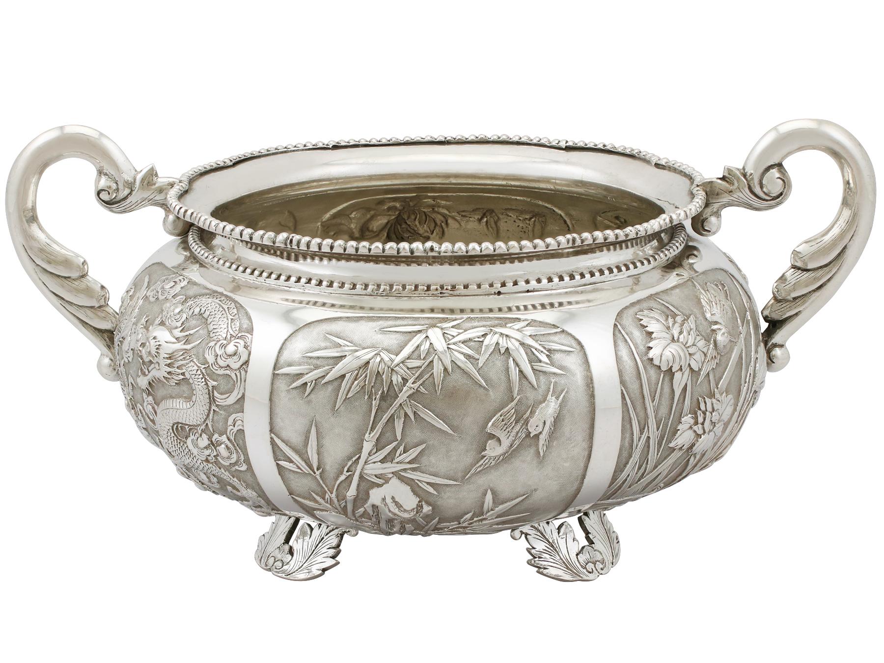 An exceptional, fine and impressive antique Chinese export silver bowl; an addition to our oriental ornamental silverware collection.

This exceptional antique Chinese export silver (CES) bowl has a compressed circular rounded form.

The body of