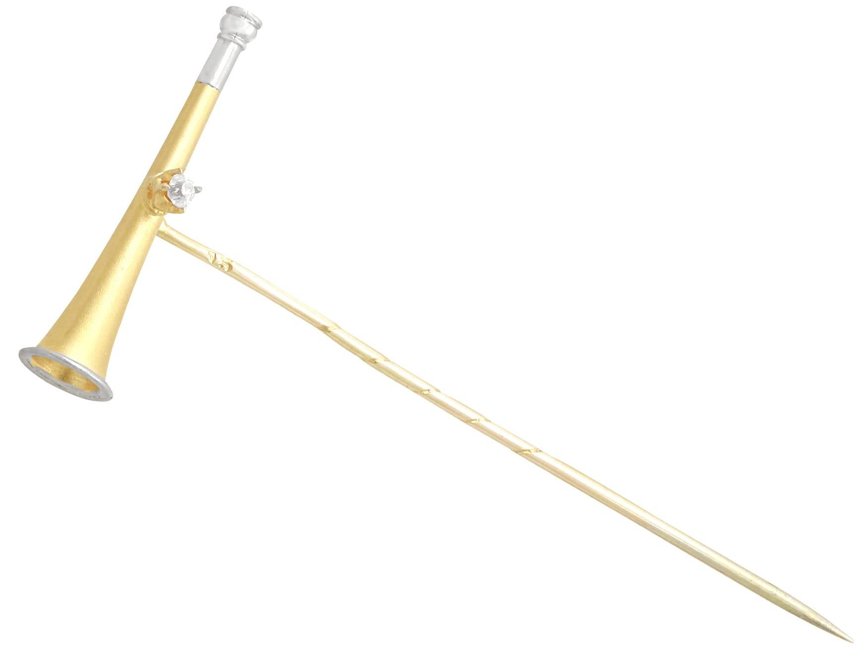 An impressive antique Victorian 0.03 carat diamond and 15 karat yellow gold, 15 karat white gold set 'hunting horn' brooch; part of our diverse antique jewelry collections.

This fine and impressive antique hunting pin brooch has been crafted in 15k