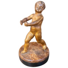 1890s Antique Fire-Gilt Bronze Cherub Sculpture on an Onyx Base