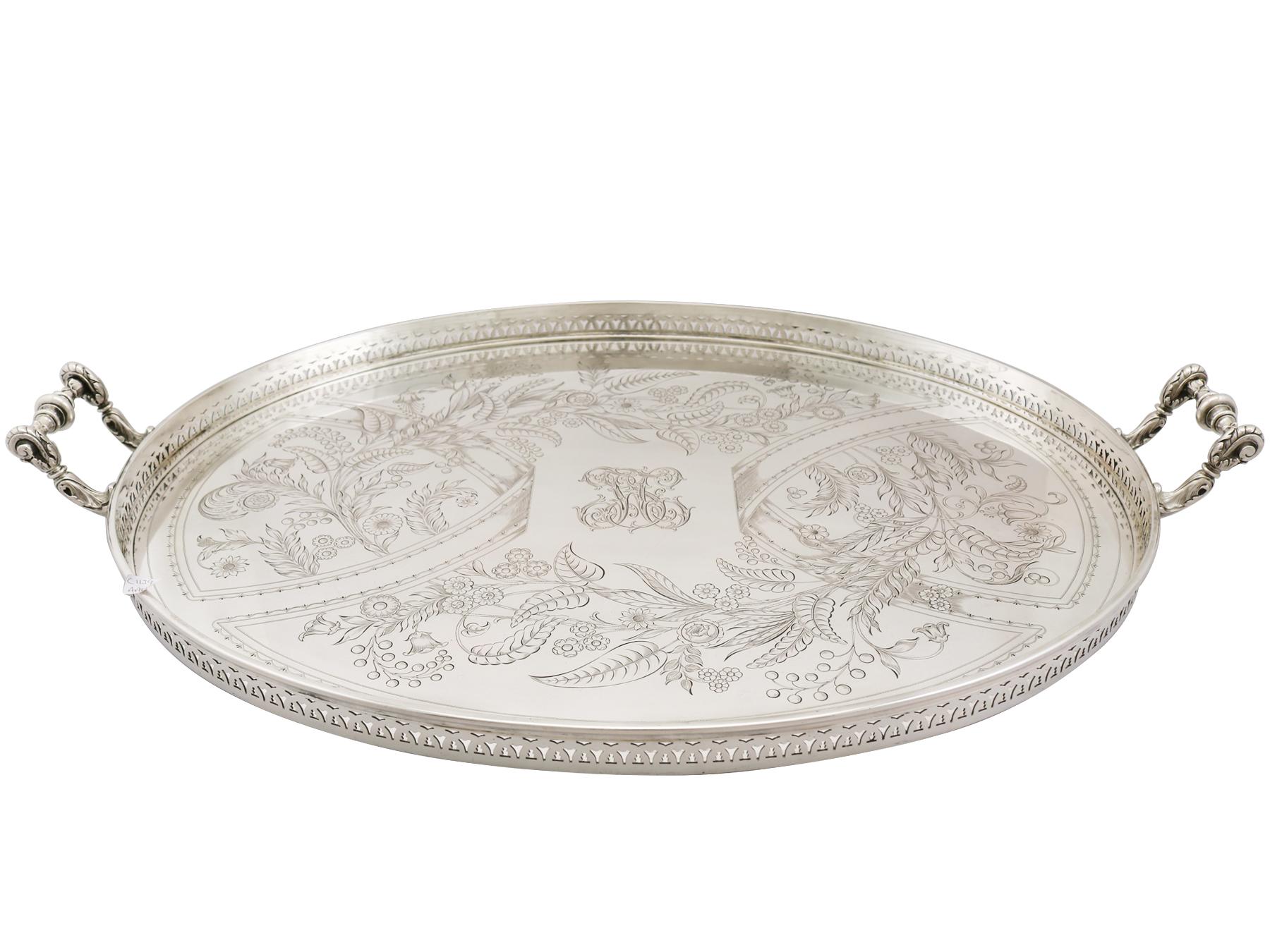 An exceptional, fine and impressive, large antique German silver galleried tea tray; an addition to our silver teaware collection.

This exceptional antique German silver gallery tray has a plain oval form.

The large surface of this antique silver