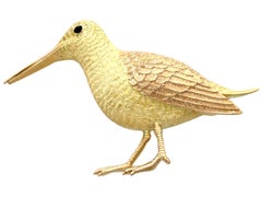 1890s Antique Onyx Yellow Gold and Rose Gold Bird Brooch