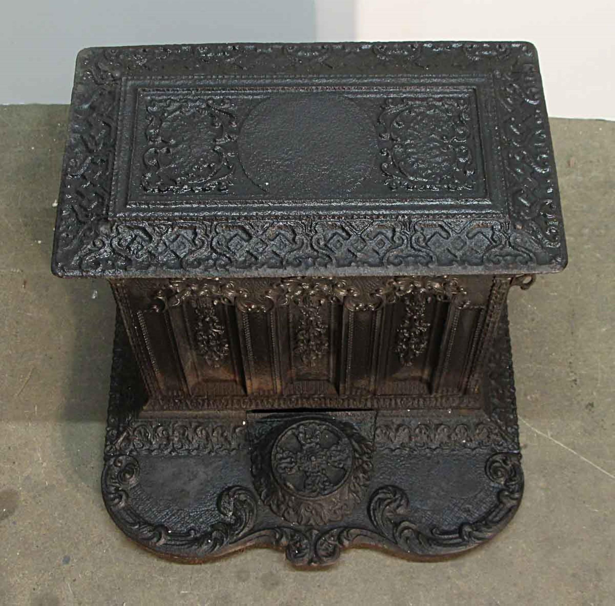 Highly ornate 1890s detailed Victorian style cast iron coal stove with a black finish. Unknown working condition. May have parts missing. For decoration only. This can be seen at our 400 Gilligan St location in Scranton. PA.