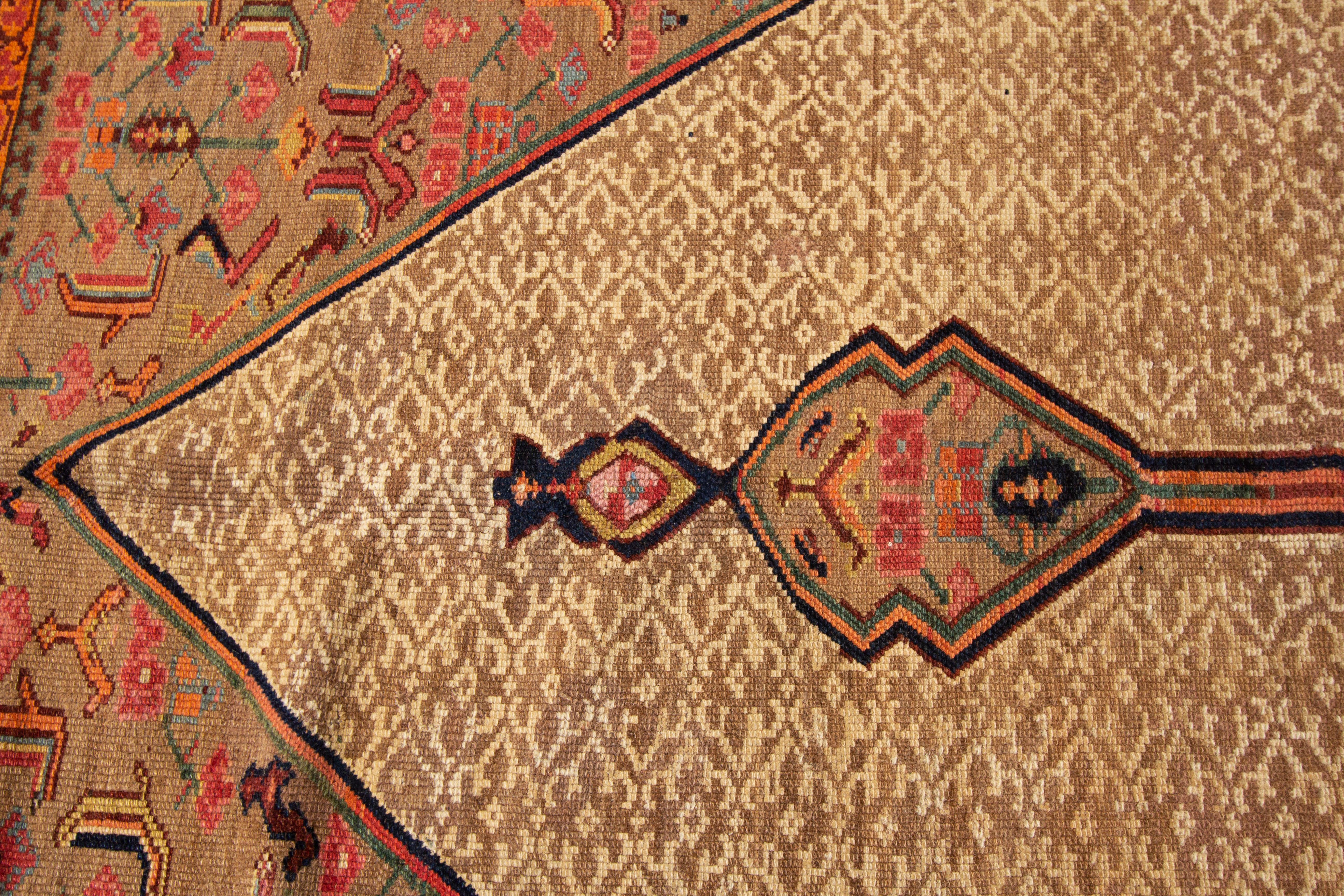 Hand-Knotted 1890s Antique Persian Serab Handmade Tan Wool Rug with Tribal Motif For Sale