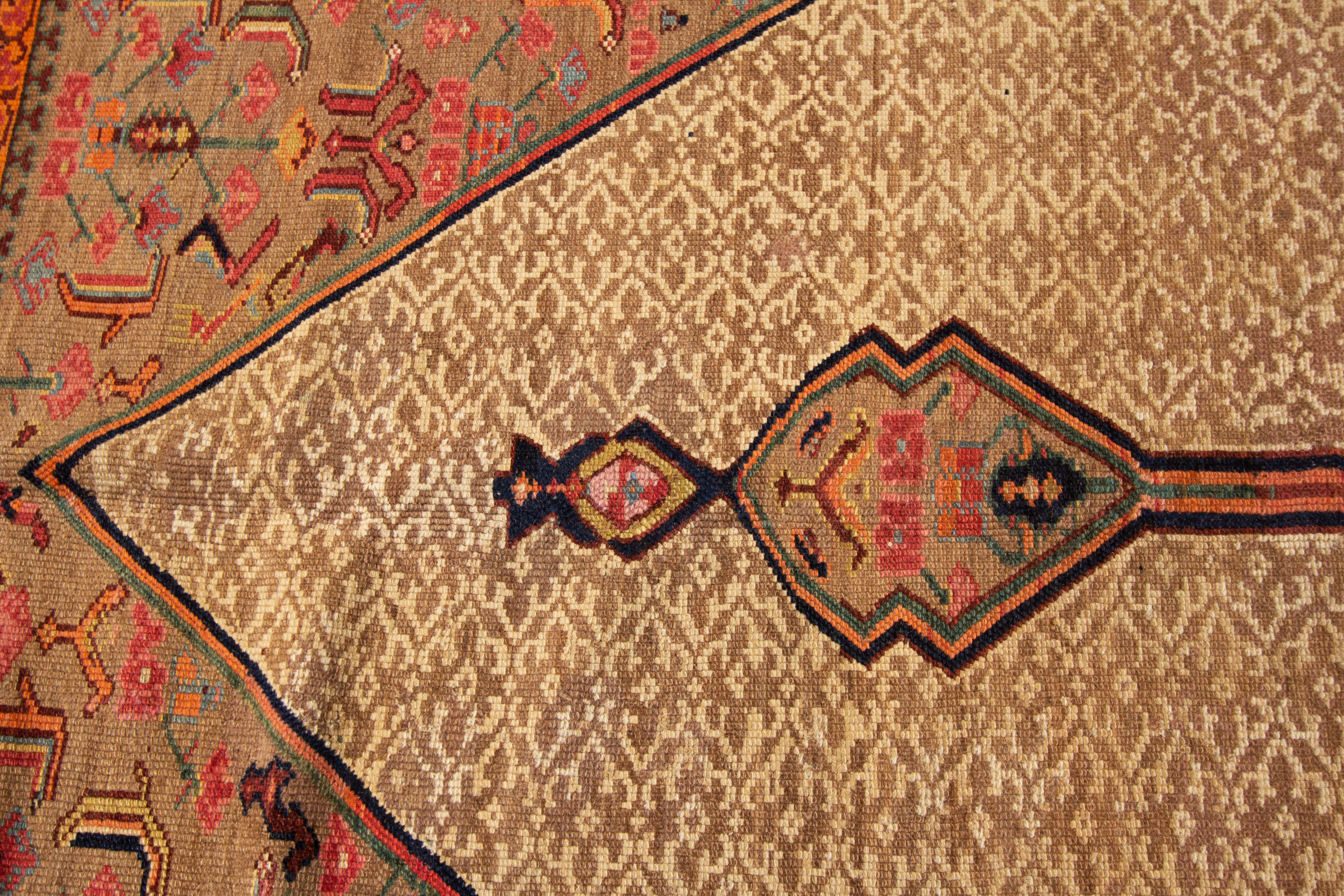 Hand-Woven 1890s Antique Persian Serab Handmade Tan Wool Rug with Tribal Motif For Sale