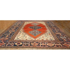 1890s Antique Red Rust Rustic Field Diamond Serapi Knotted Palace Size Wool Rug