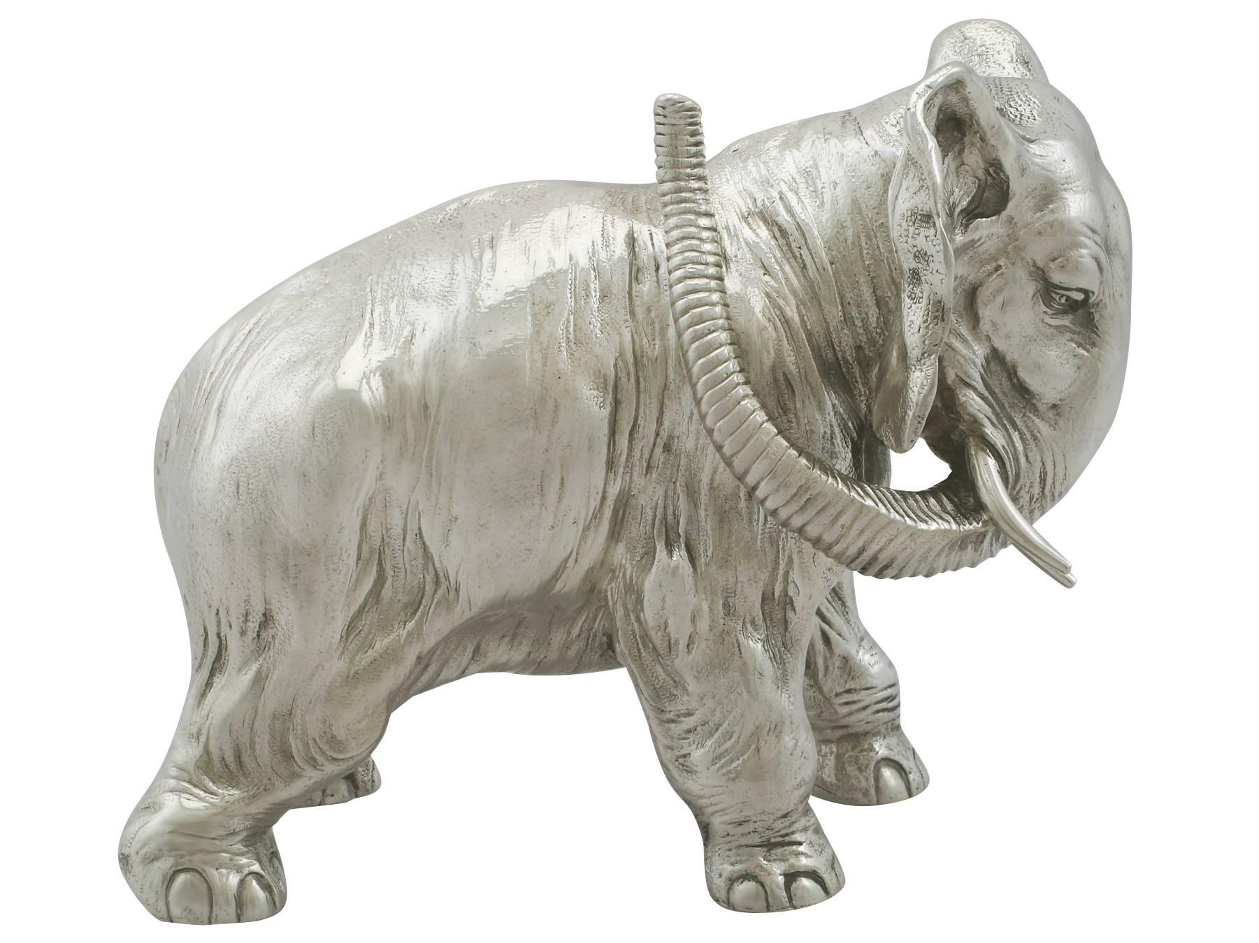 A magnificent, fine and impressive antique Russian silver table ornament of an elephant by Karl Fabergé; part of our ornamental silverware collection.

This magnificent antique cast Russian silver ornament has been realistically modelled in the form
