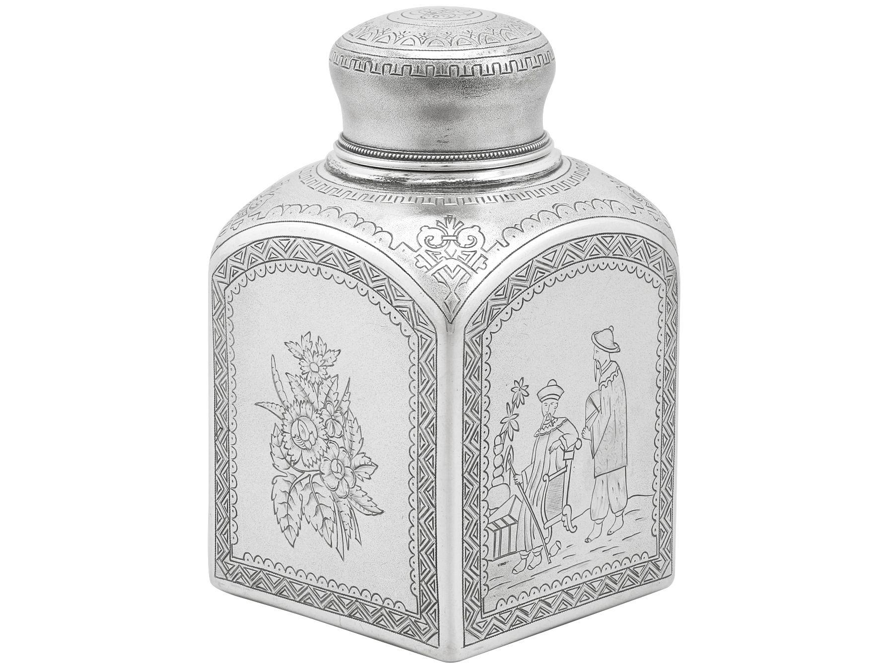 This exceptional antique Russian silver tea caddy has a cuboid shaped form with rounded shoulders.

The surface of this silver tea caddy has a matte textured finish and is embellished with panels of alternating engraved decoration depicting a floral