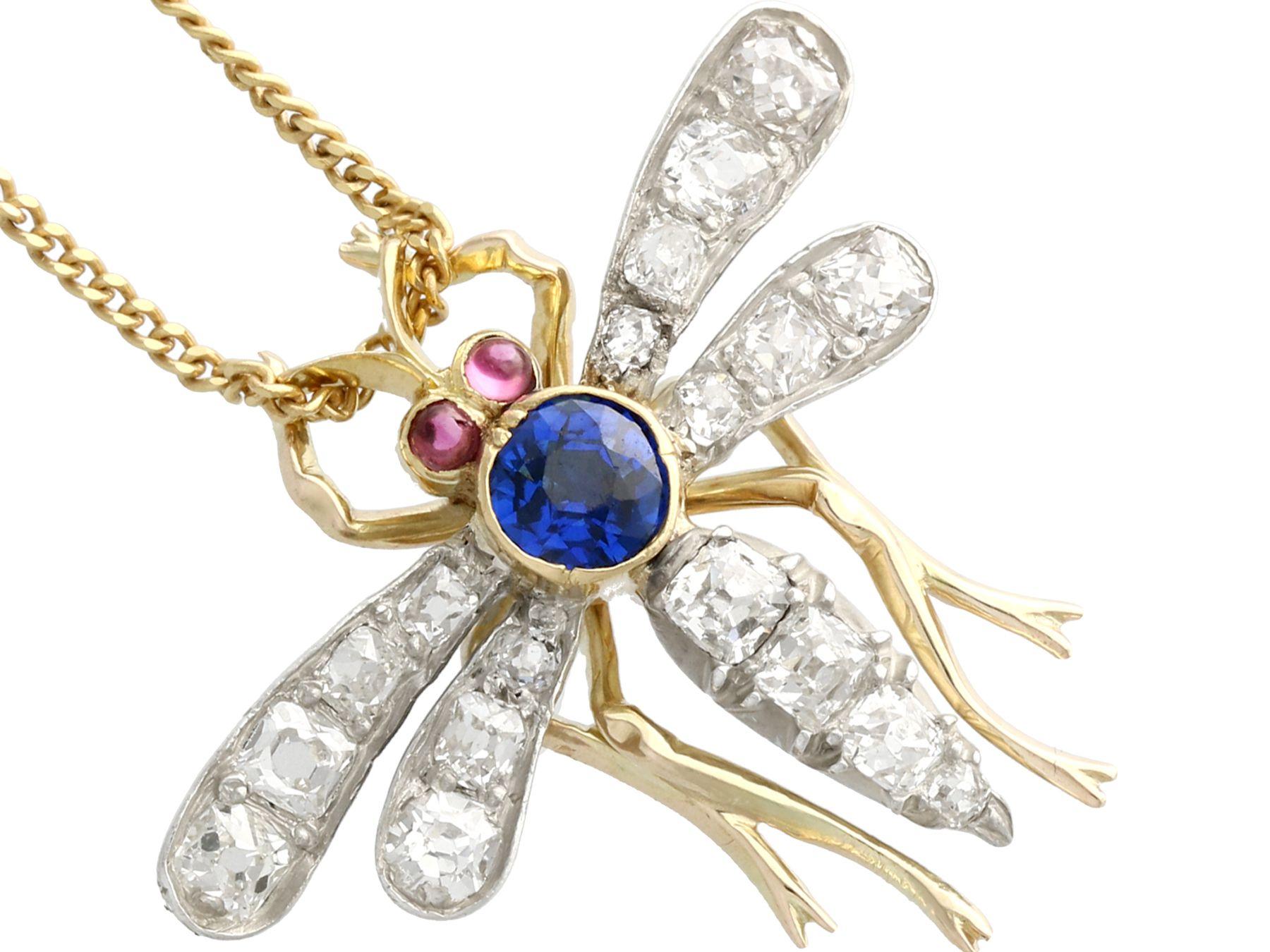 Round Cut 1890s Antique Sapphire Diamond and Ruby Yellow Gold Dragonfly Pendant / Brooch
