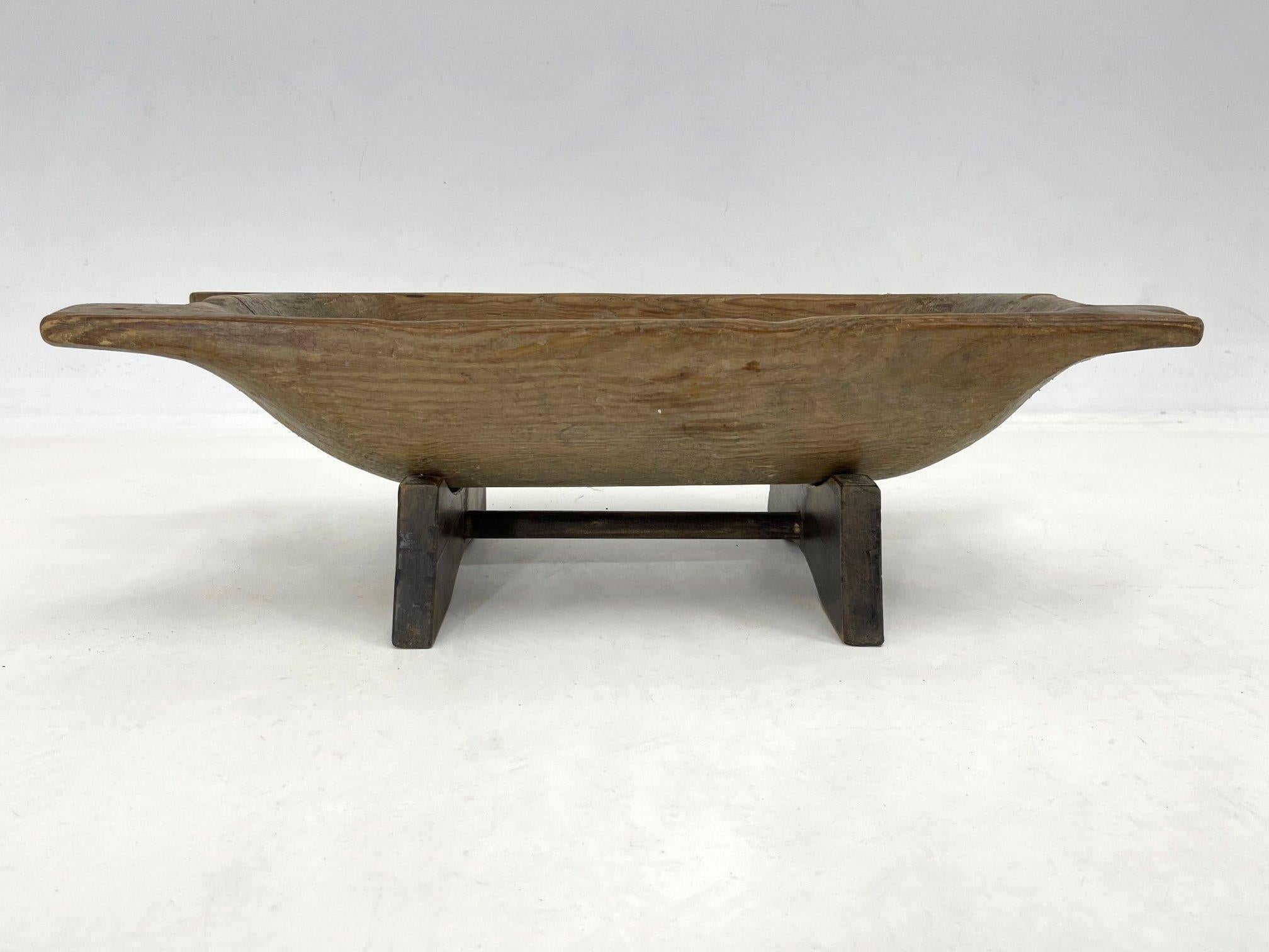Antique wooden dough trough on original stand in unrestored, untreated original condition. A beautiful home decoration that can be used in many different ways. The height without the stand is 13 cm.