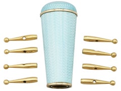 Poignée d'ombrelle et pointes de côtes en or jaune et émail des années 1890