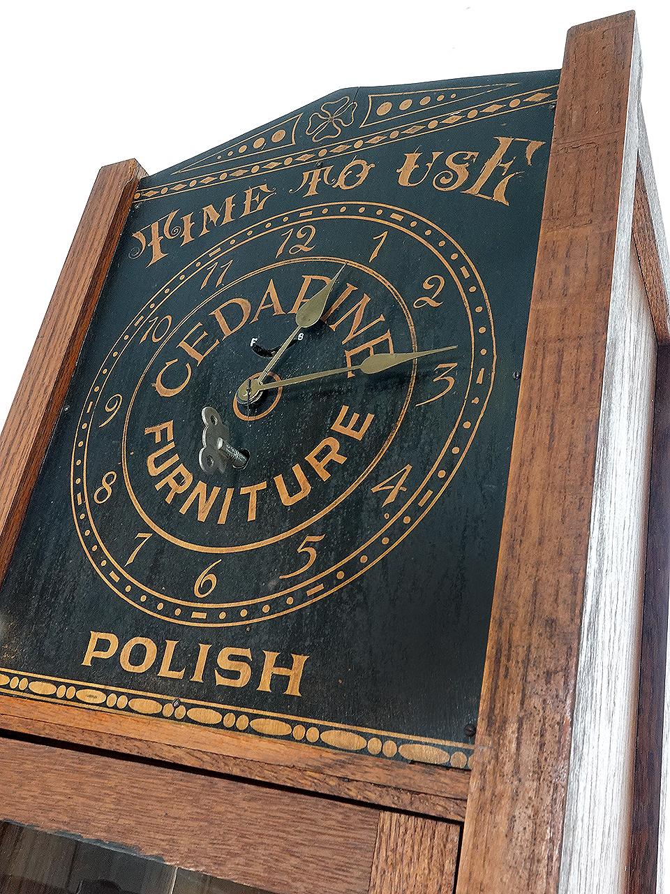 This is a very rare and unusual Arts and Crafts advertising clock display cabinet. It reads.. Time to Use Cedarine Furniture Polish. This example is as clean and fresh as it gets and the clock is in nice working order. It came out of an old and