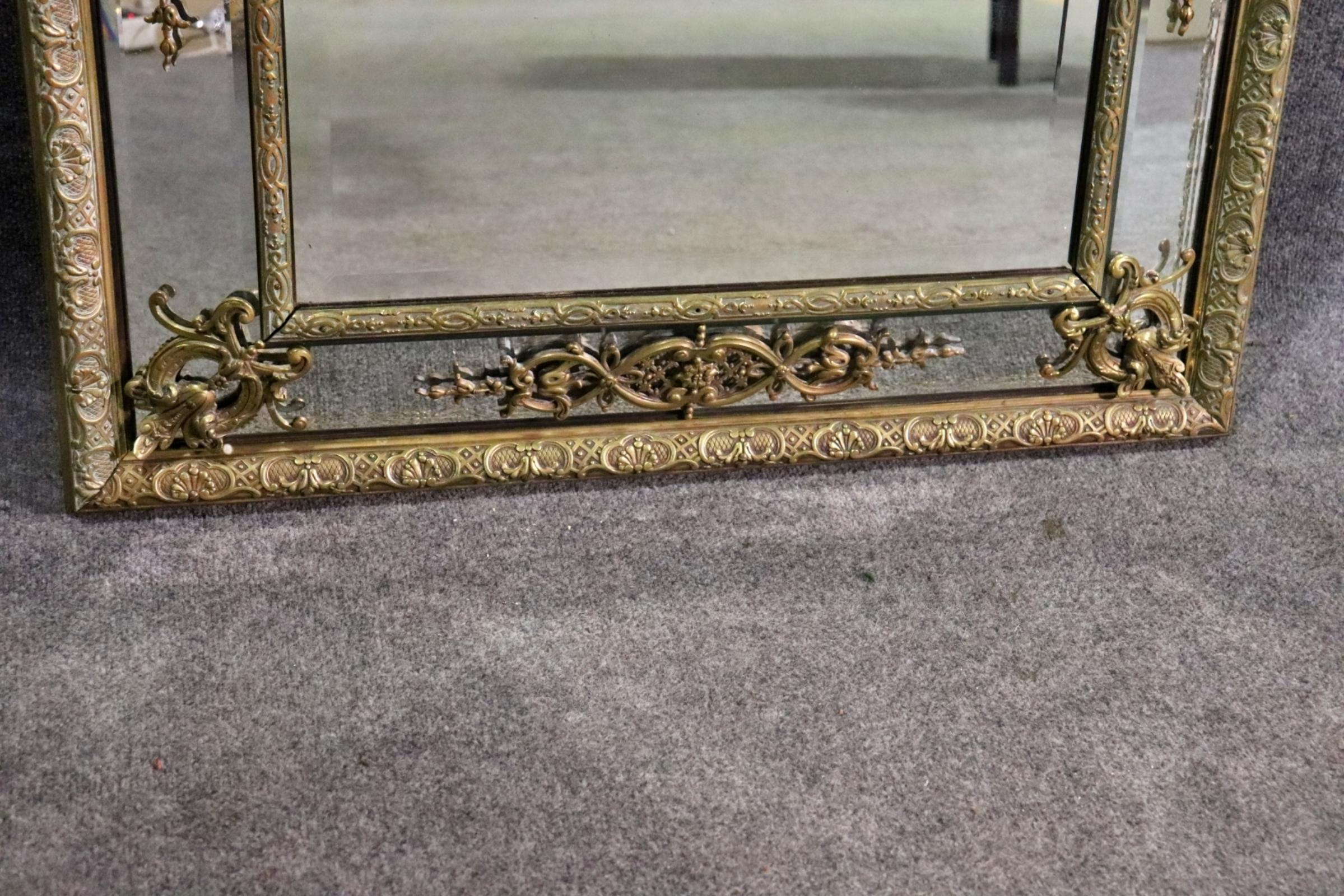 Turn of the century Neoclassical Bronze wall mirror. Bronze frame with beveled glass mirror


Dimensions:. 42 5/8