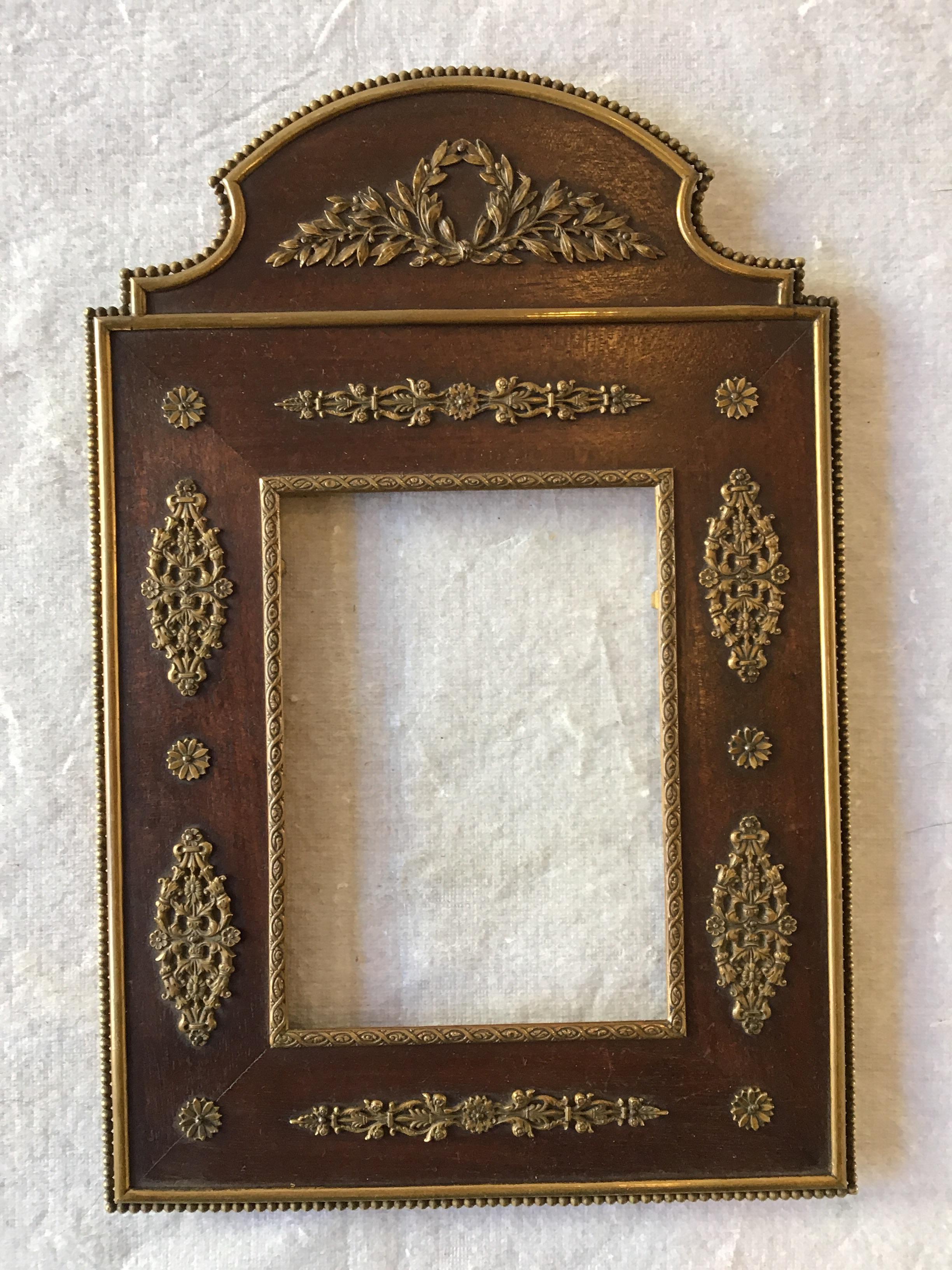 1890s French neoclassical wood and bronze frame. No glass or easel backing.
Measurement of inset is 4 x 5.5.