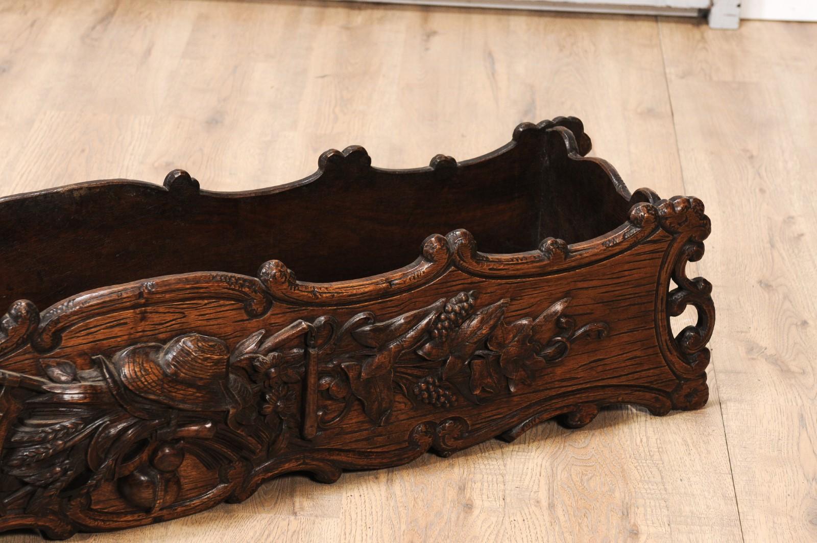19th Century 1890s French Oak Planter with Carved Gardening Themed Frieze For Sale