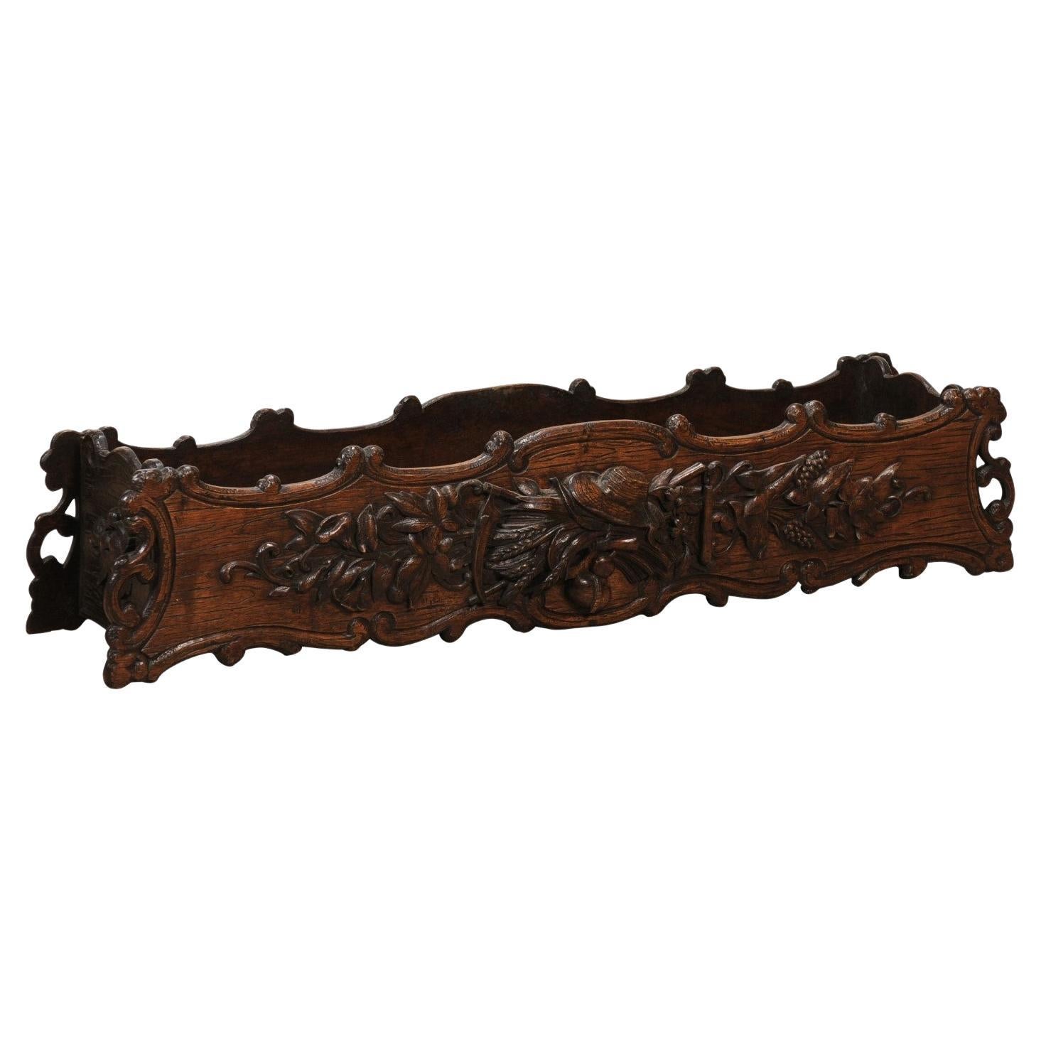 1890s French Oak Planter with Carved Gardening Themed Frieze For Sale