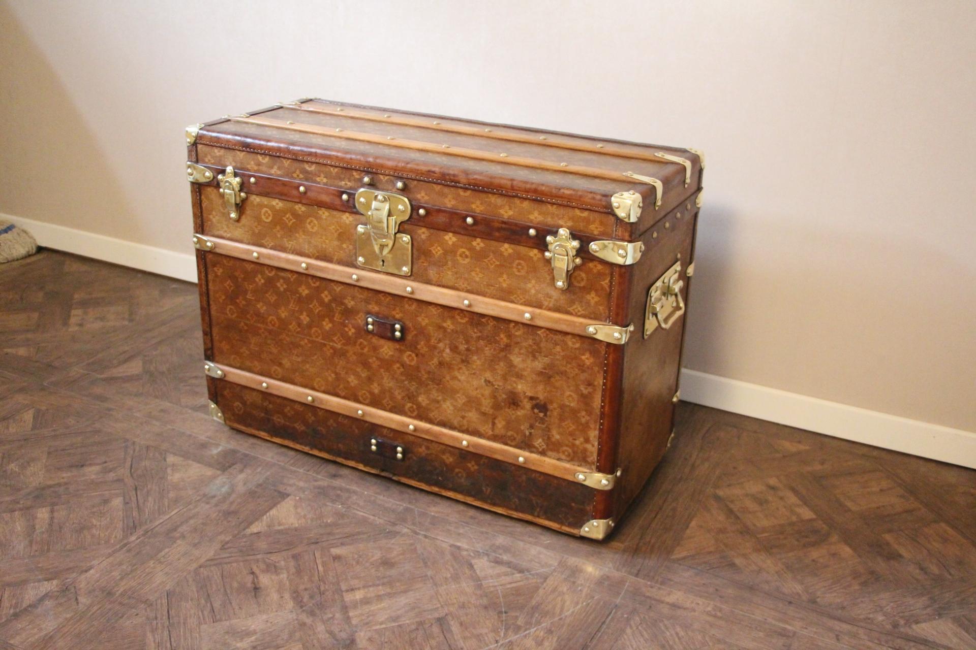 This magnificent Louis Vuitton shoe trunk features the very sought after woven canvas monogram, Louis Vuitton stamped solid brass locks, studs and side handles. It also has got very deep brown all leather trim. It has got a beautiful and warm patina