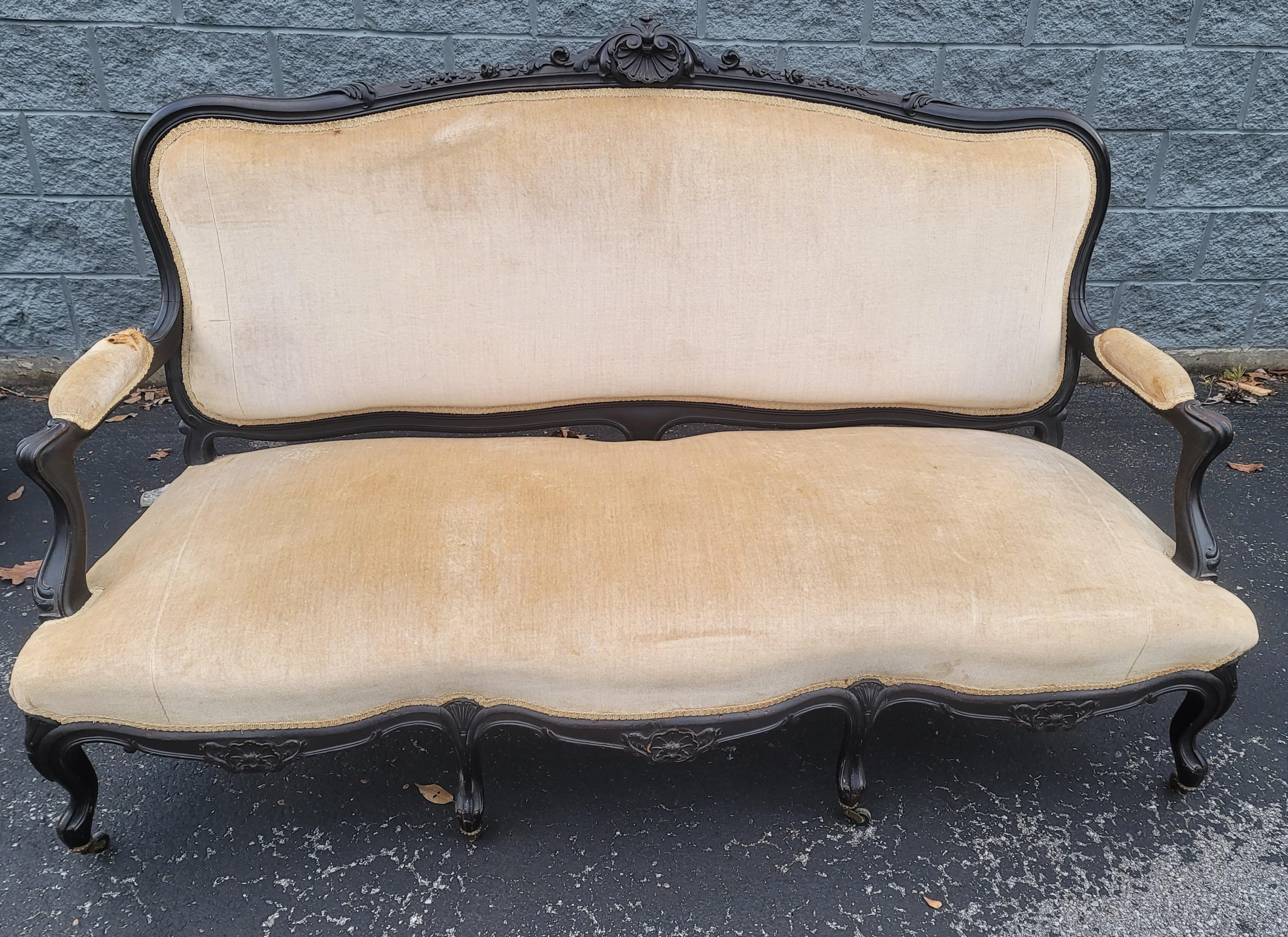 Upholstery 1890s Louis XV Carved, Ebonized and Upholstered Sofa For Sale