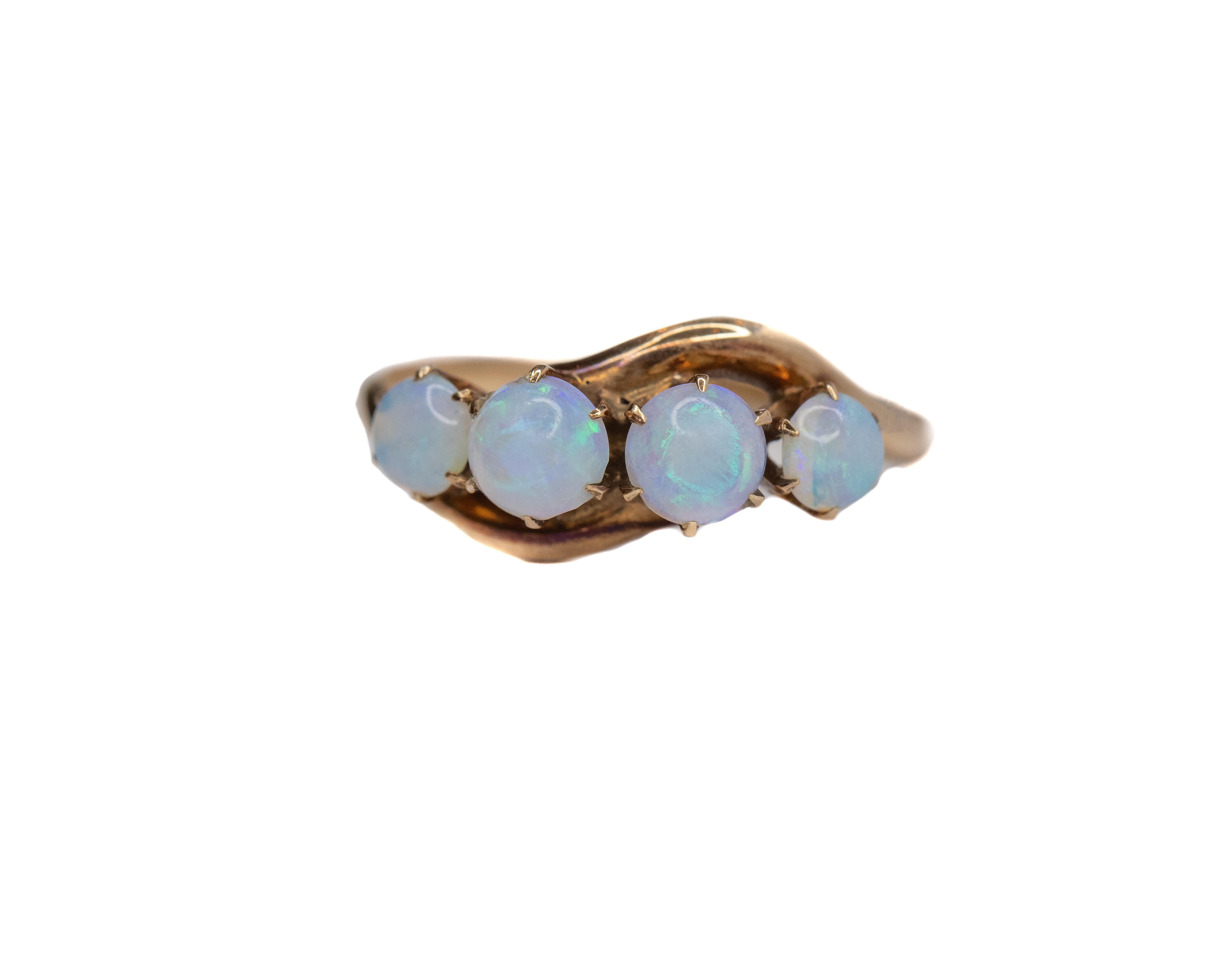 Ring Details:
Metal: 14 Karat and 9 Karat Yellow Gold
Weight: 1.89 grams
Ring Size: 7 (resizable)

Opal Accent Details: 4 Count, .5 carat total weight 

Victorian ring, from the 1890s with a simple, yet elegant design featuring 4 opals in u-prong