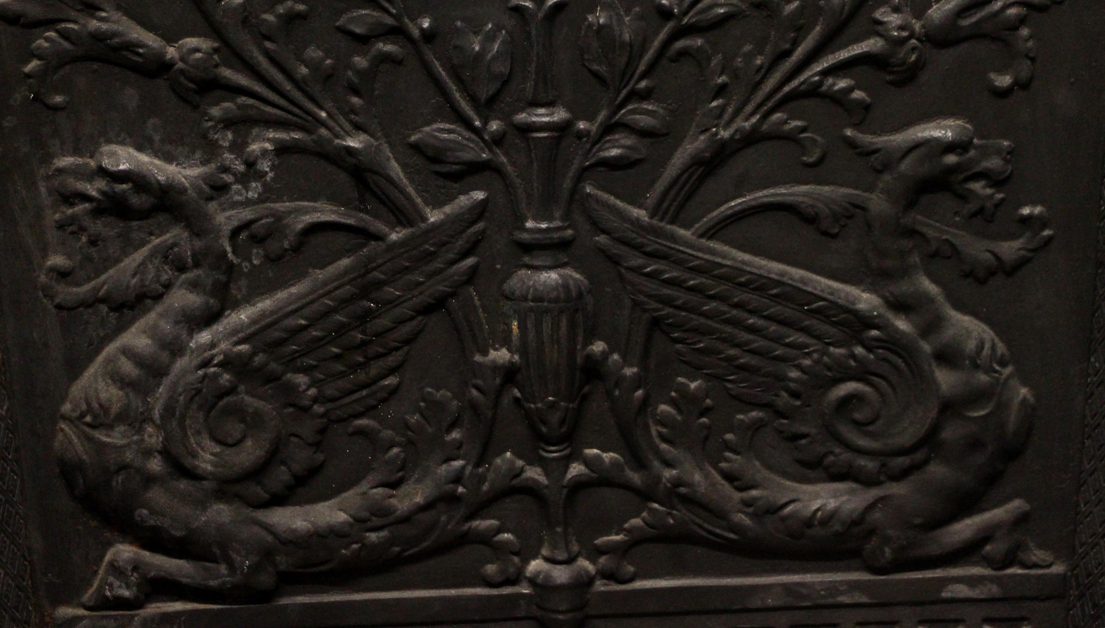 1890s Ornate Figural and Floral Black Cast Iron Fire Back In Good Condition In New York, NY