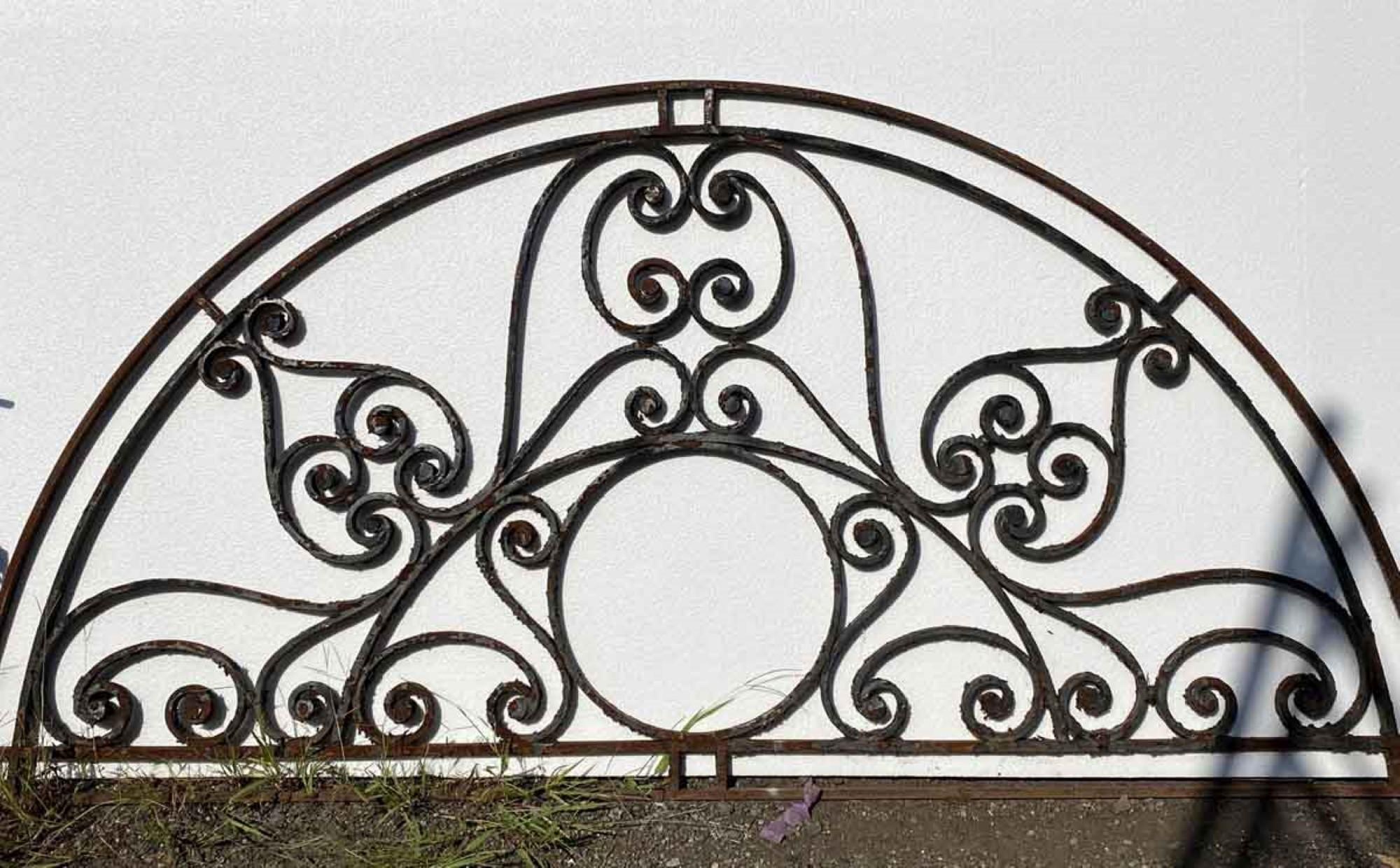 1890s Ornate Wrought Iron Arched Door Transom with Hand Forged Curls In Good Condition In New York, NY
