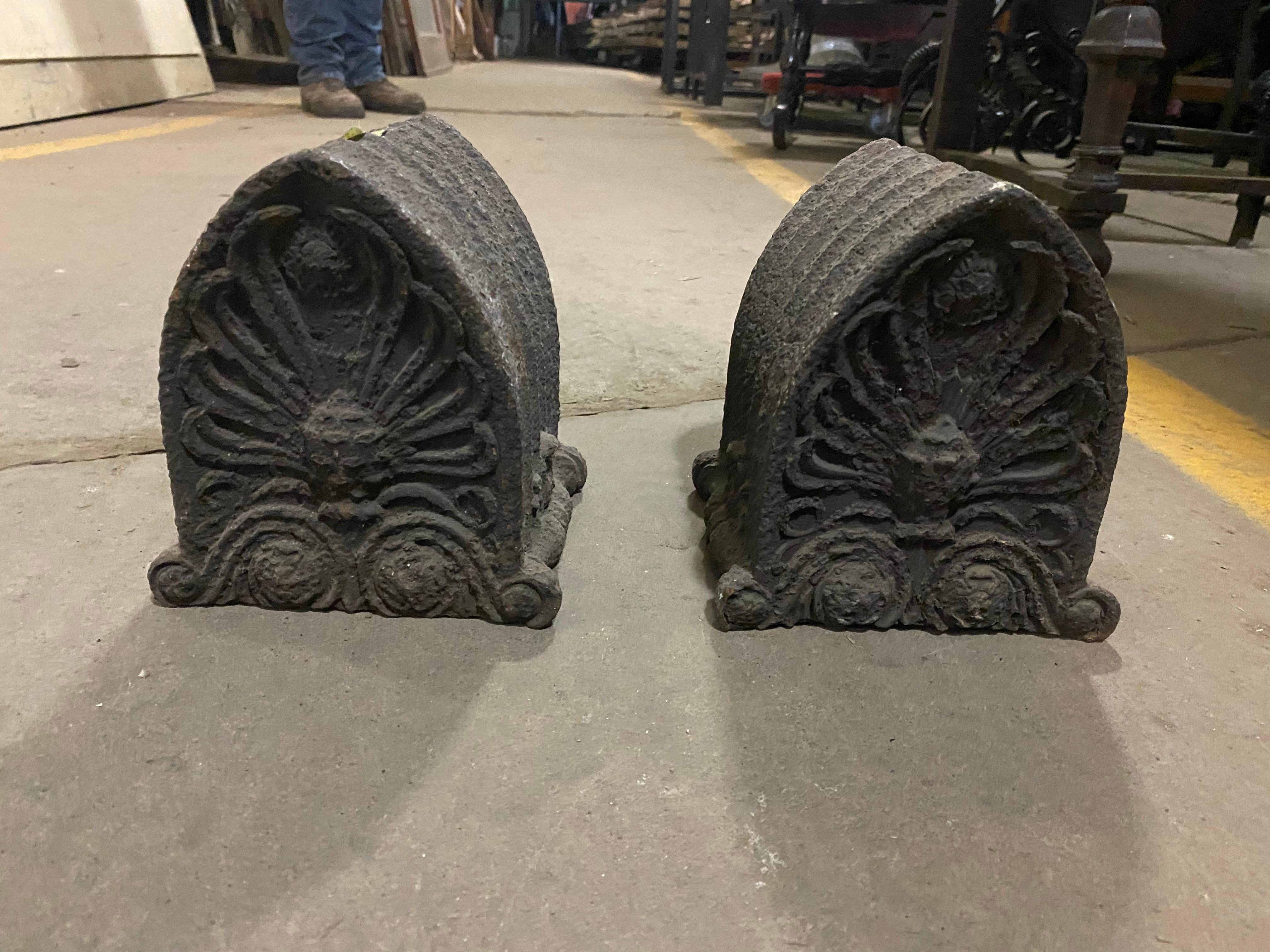Pair of cast iron ornaments from a 1890s Gothic building cornice. These make great bookends or other mantel piece décor. Priced as a pair. Please note, this item is located in our Scranton, PA location.