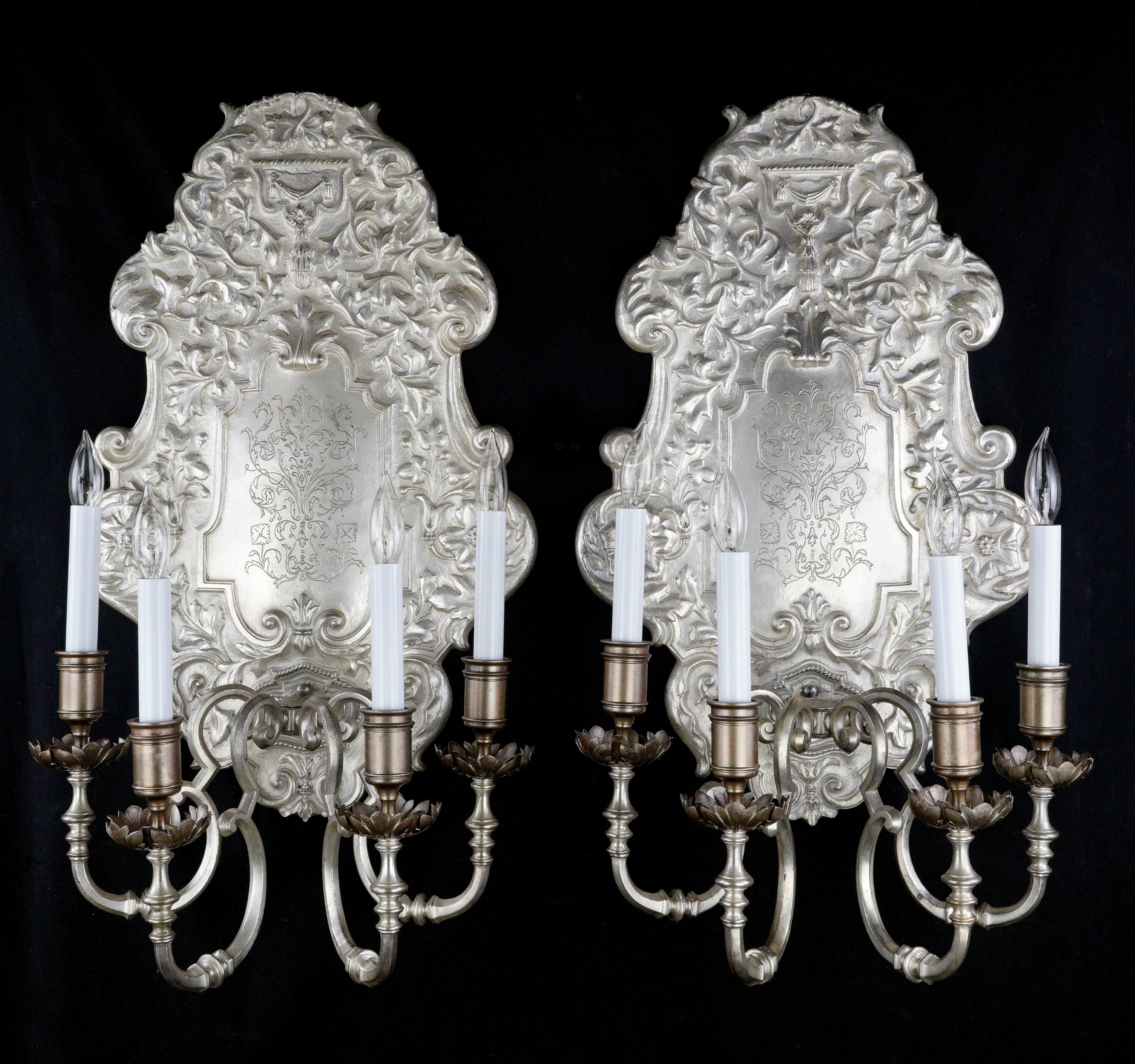 This pair of oversized silvered bronze sconces by EF Caldwell is a testament to the craftsmanship and design sensibilities of the late 19th century. Made in America during the late 1890s, these sconces showcase the artistry of the era.
The sconces