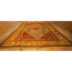 1890s Red Field Medallion Knotted Wool Antique Oushak Turkish Decorative Rug
