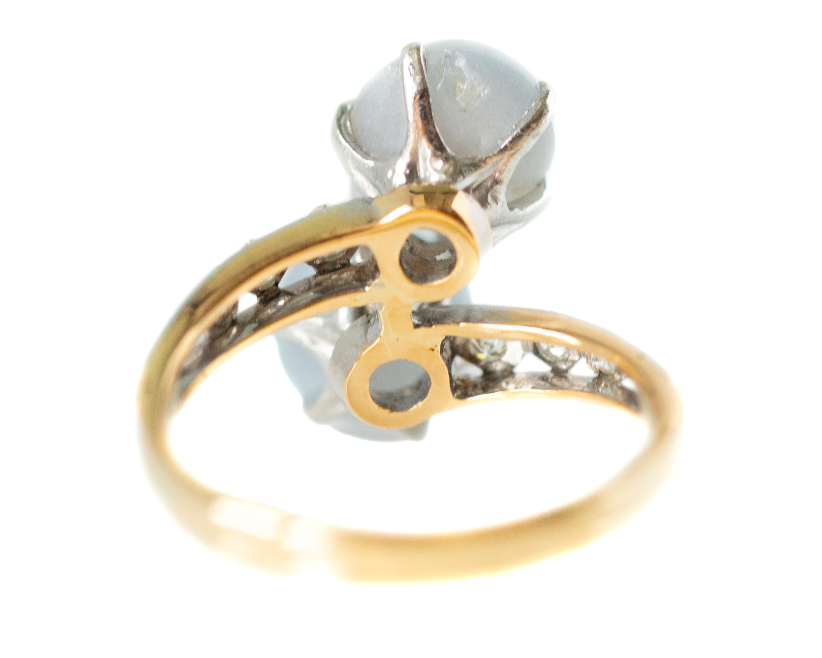 Round Cut 1890s Star Sapphire and Diamond 'Toi et Moi' Bypass 14 Karat White Gold Ring