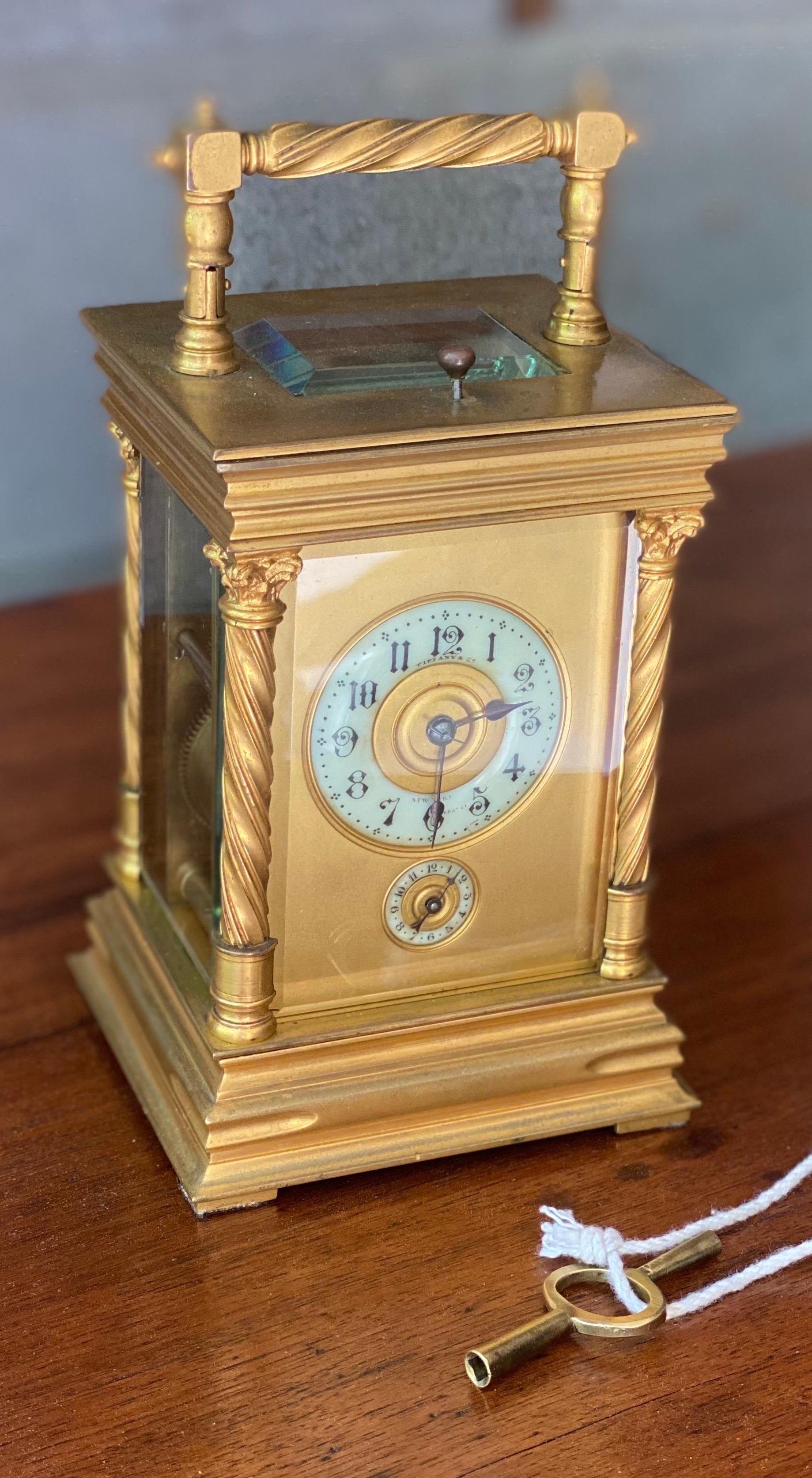 Great 1890s Tiffany gilt brass carriage alarm clock with key.