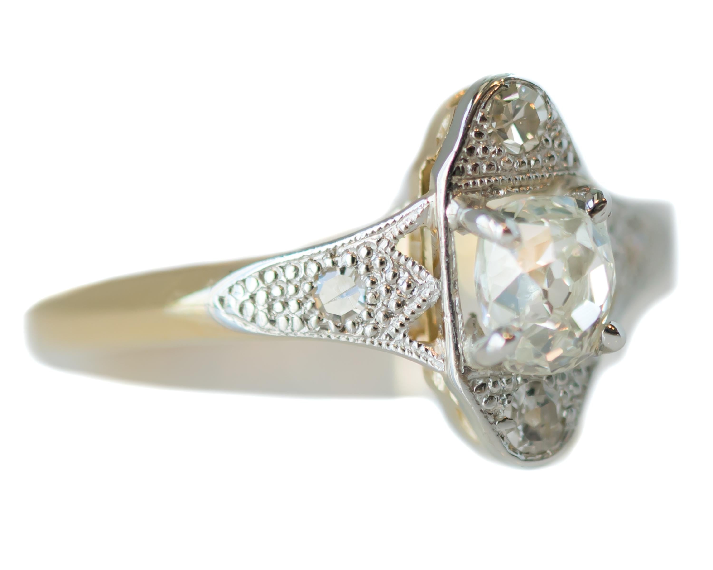 Antique Victorian Diamond Engagement Ring - Platinum, 18 Karat Yellow Gold, Diamonds

Features:
0.60 carat Old Mine Cushion cut Diamond Center Stone
0.10 carat total Single cut Diamond Side Stones ( Quantity 4 )
Platinum Head
18 Karat Yellow Gold