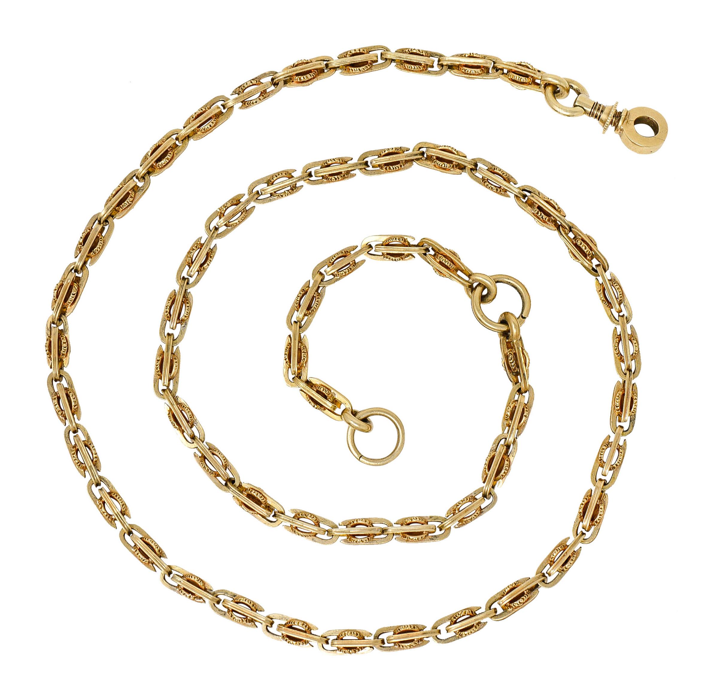 Necklace is comprised of barrel style links

Deeply grooved with texturous accenting

With two jump ring stations for adjustable length and style

Completed by an antique clasp the opens on a hinge

Securely locks closed via a safety that screws in
