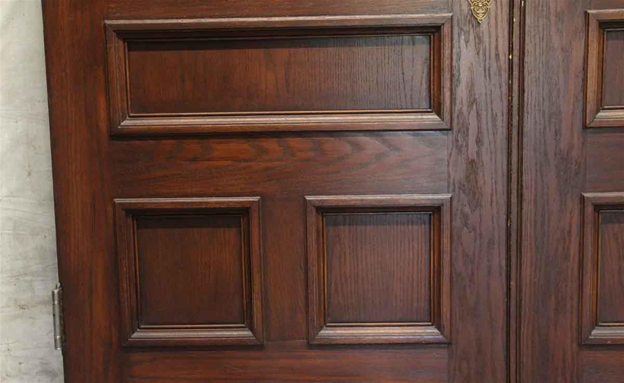 1890s brownstone doors made of American chestnut with rare original Victorian hardware lock set. Priced as a double. Very good condition. This can be seen at our 400 Gilligan St location in Scranton, PA.