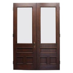 1890s Victorian American Chestnut Double Brownstone Doors with Glass