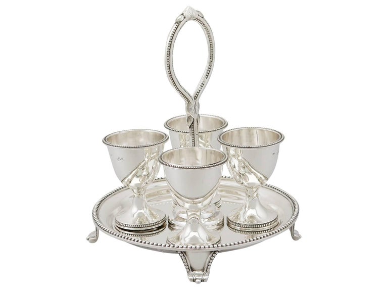 An exceptional, fine and impressive, antique Victorian English sterling silver egg cruet set for four persons, made by John Aldwinckle & Thomas Slater; part of our dining silverware collection

This exceptional antique sterling silver egg cruet