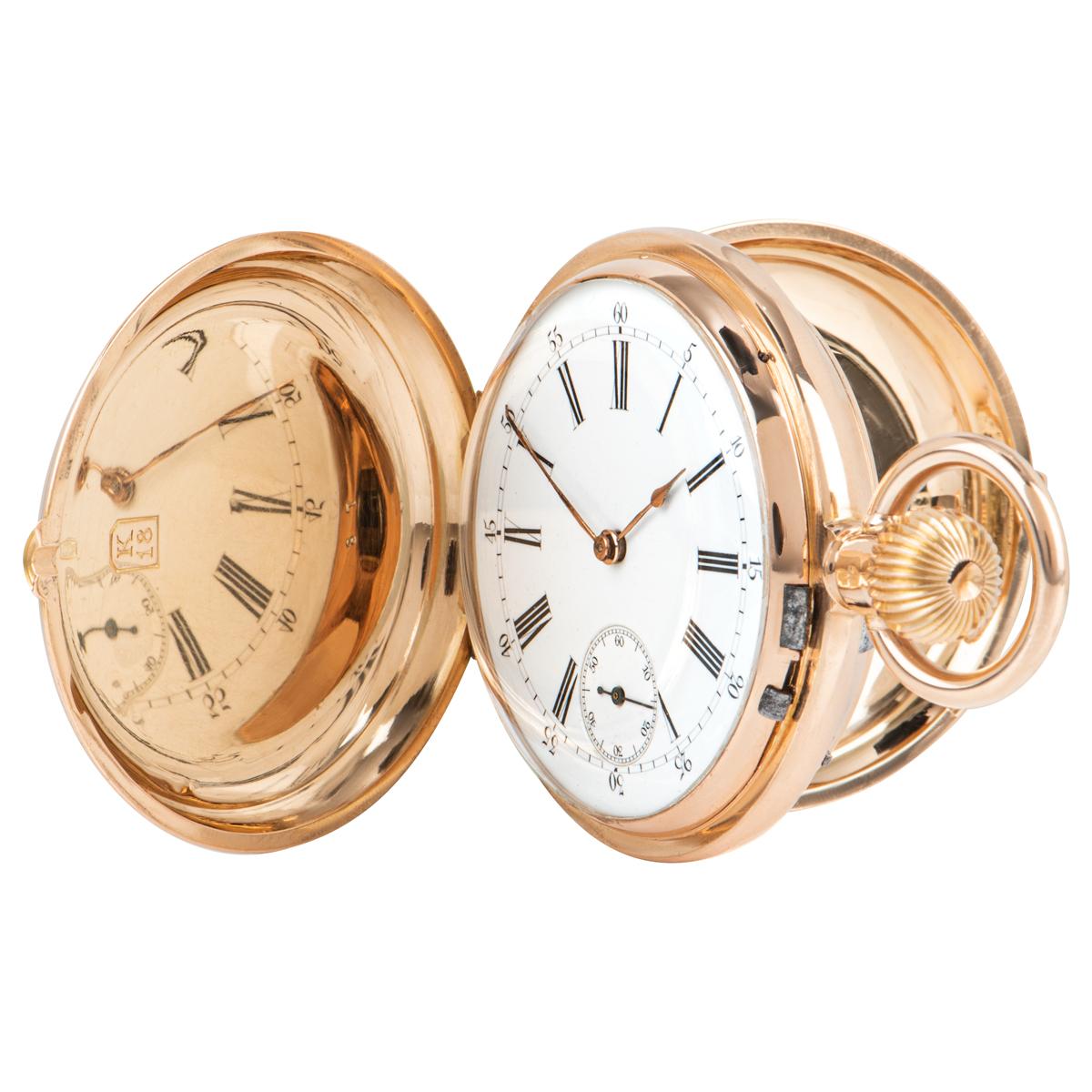 A Rare 18k Rose Gold Full Hunter Double Sided Calendar Vintage Gents Pocket Watch, white enamel dial with roman numerals, small seconds at 6 0'clock, enamel chapter ring on the reverse side with the date and day display indicator, a fixed 18k rose